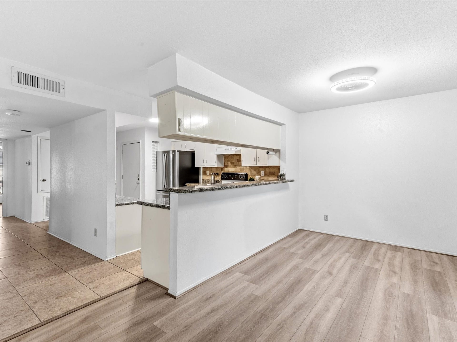 Open dining area conveniently located near the kitchen, offering a great space for everyday meals.