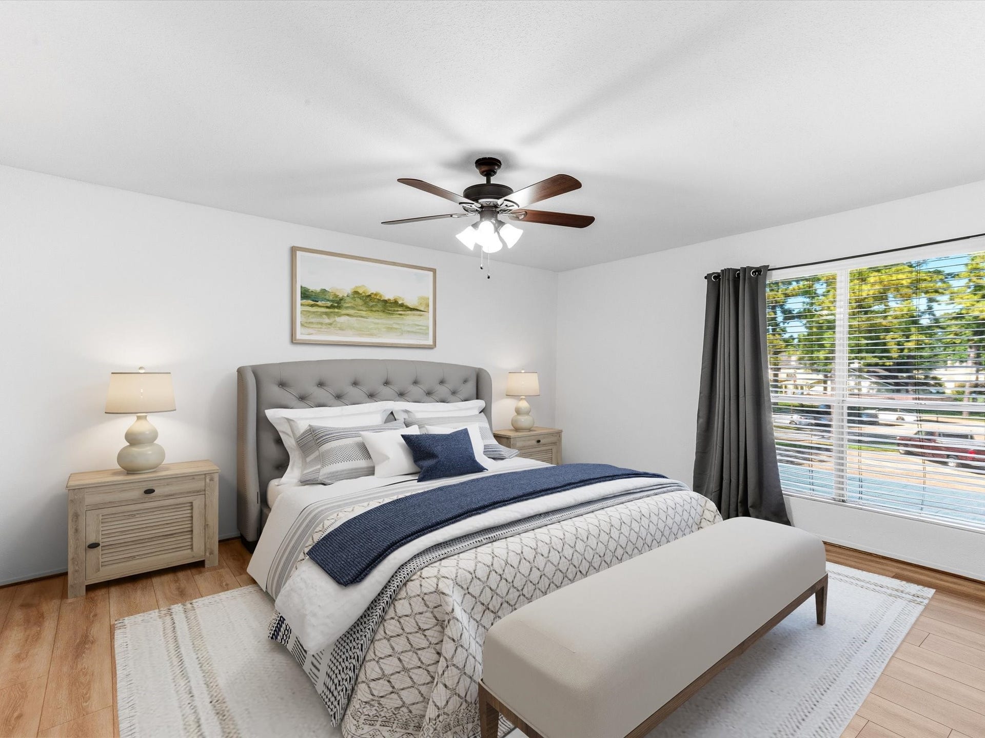 Virtually staged bedroom showcasing its spacious layout and natural light from the large window.