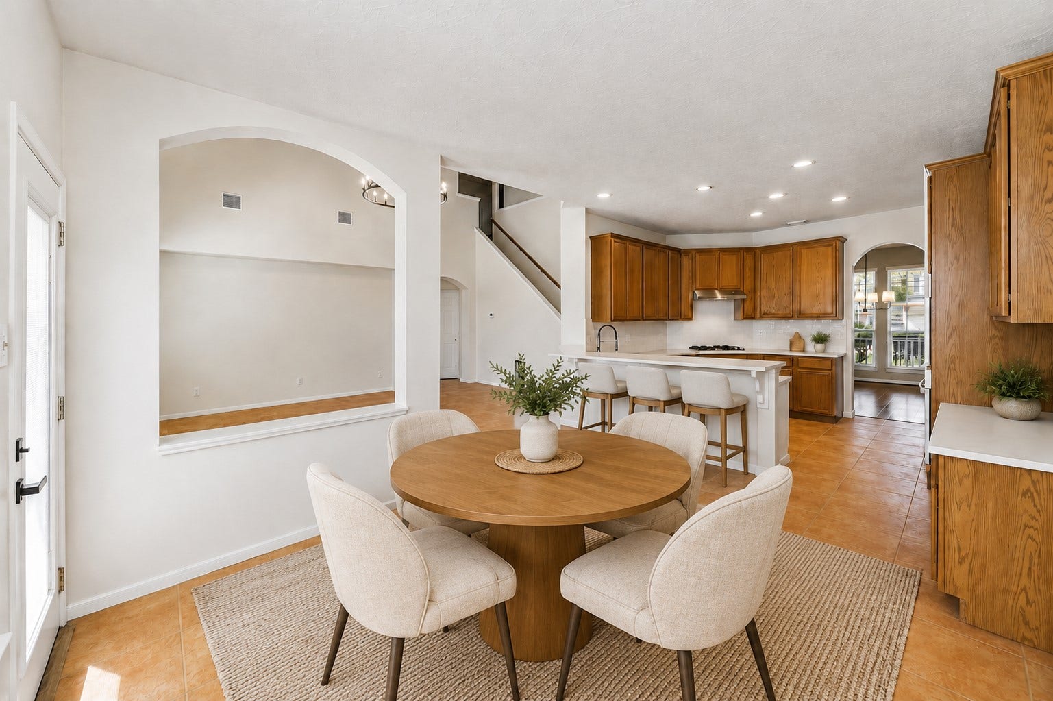 8126 BUFFALO SPRINGS COURT, Sugar Land, TX 77479 BRIGHT BREAKFAST AREA WITH AN OPEN CONNECTION TO THE KITCHEN, GENEROUS FLOOR SPACE, AND EASY ACCESS TO THE BACKYARD. *Virtually staged.