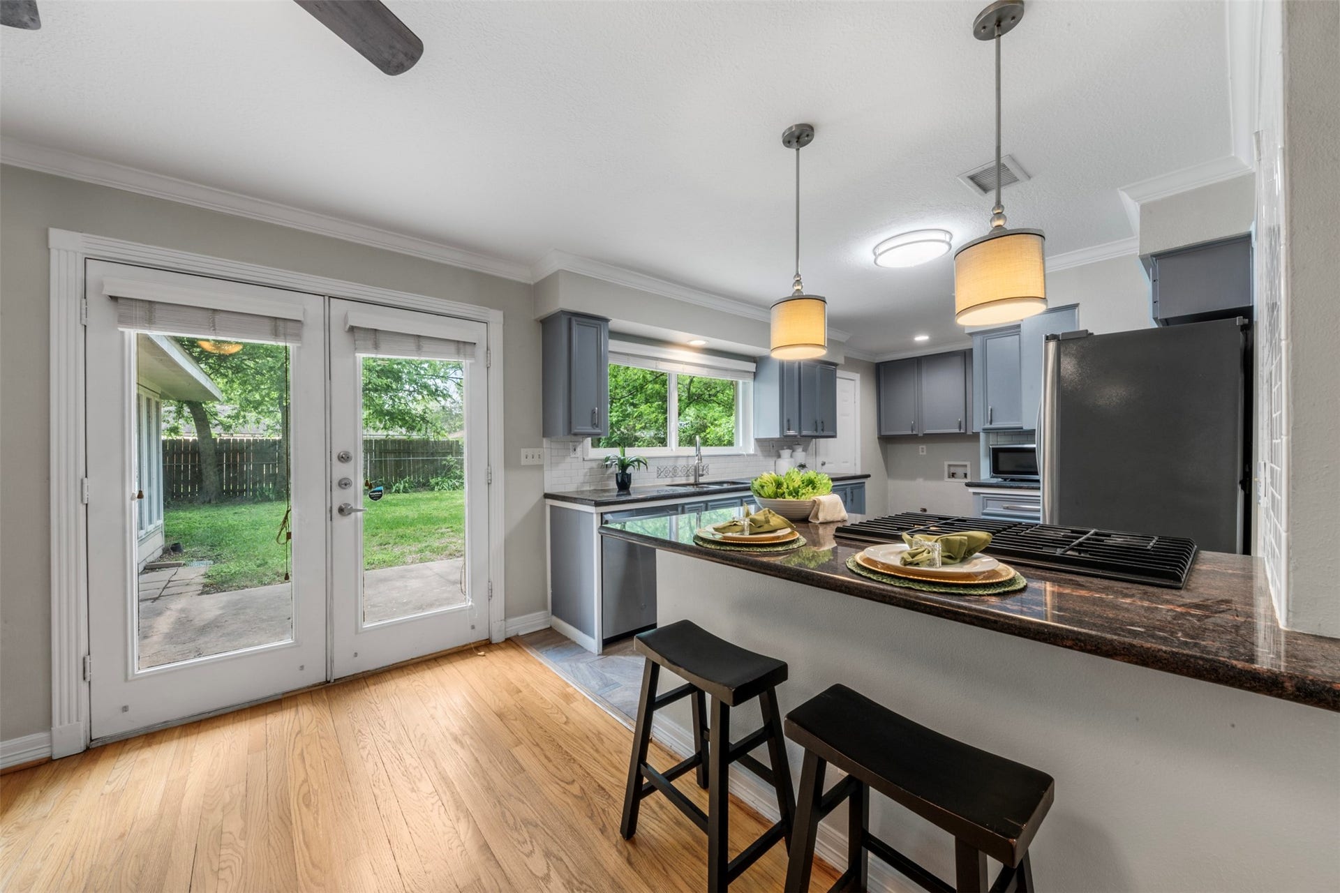 This bar top provides extra seating and expands the space for socializing with friends and family while cooking.