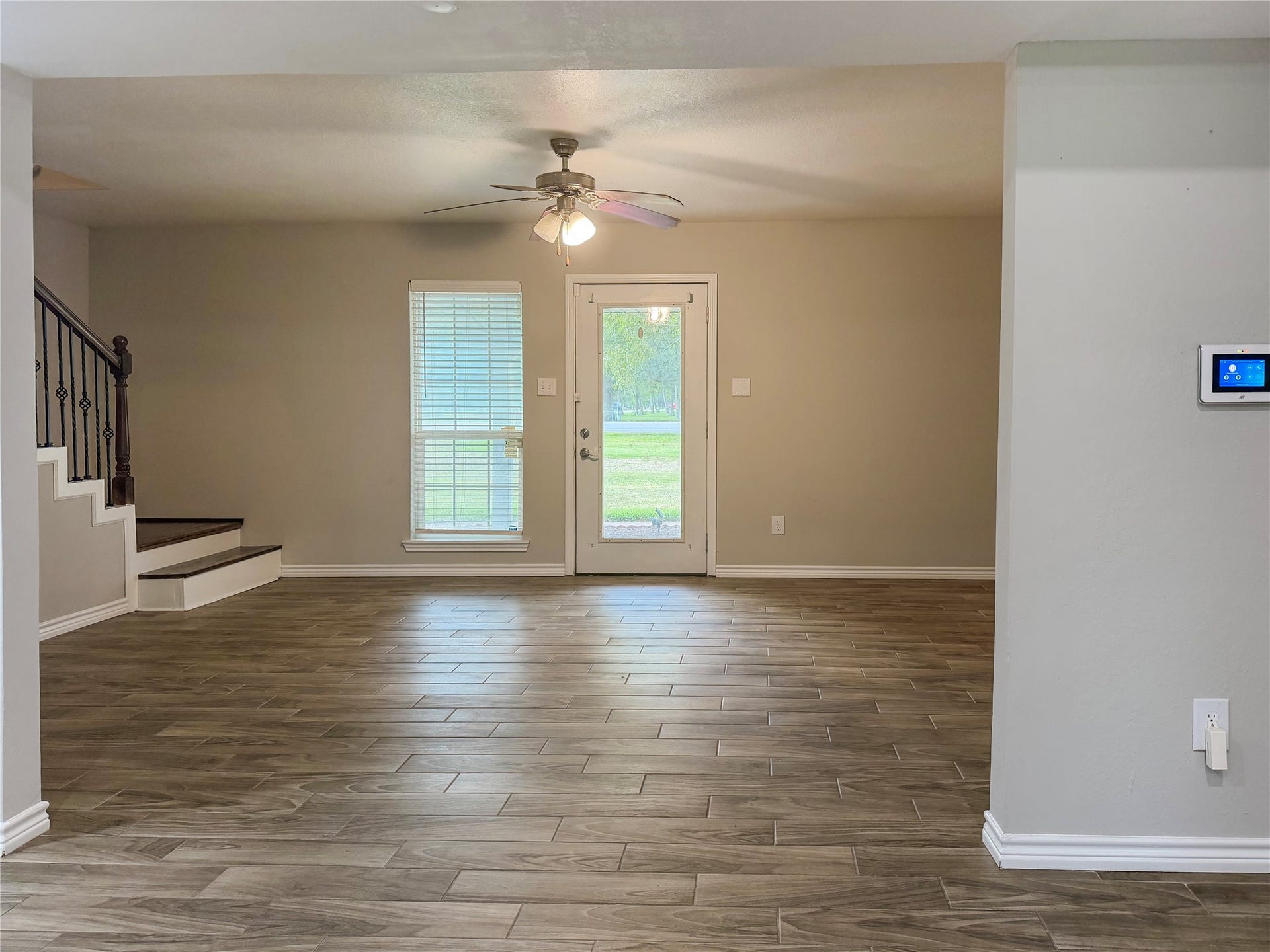 816 W Mulberry, Angleton, TX 77515 Front entry opens directly into the living room, creating a welcoming space for relaxing or entertaining.