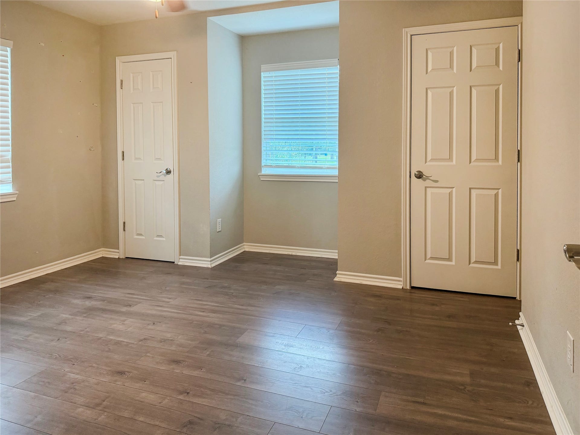 816 W Mulberry, Angleton, TX 77515 Two additional bedrooms located upstairs, offering comfortable spaces with flexibility for a variety of uses.