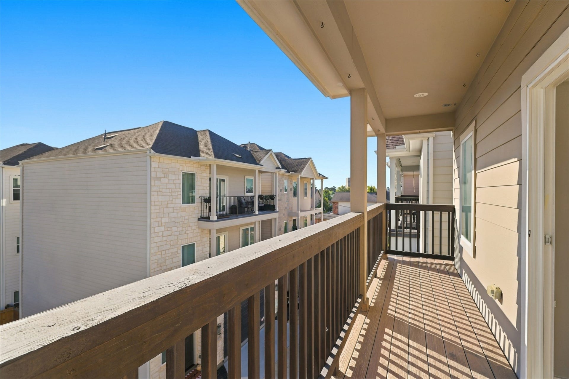 1444 W 34th 1/2 Street, Houston, TX 77018 Step directly from the primary suite onto its private covered balcony - an ideal spot for morning coffee, fresh air, or winding down at the end of the day.