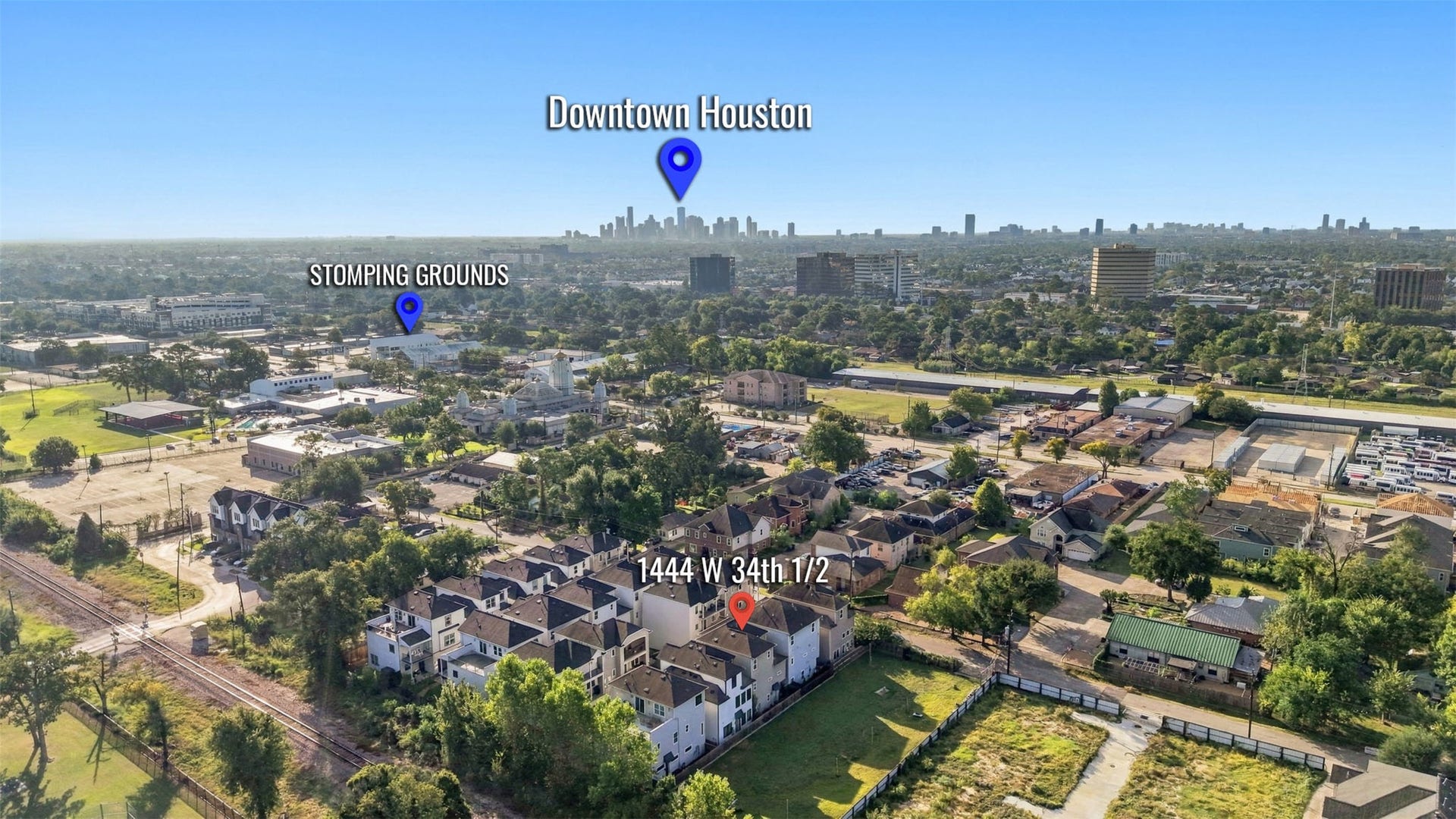 1444 W 34th 1/2 Street, Houston, TX 77018 An aerial view highlights the homes central Houston location, with Downtown on the horizon and popular neighborhood destinations like Stomping Grounds just minutes away.