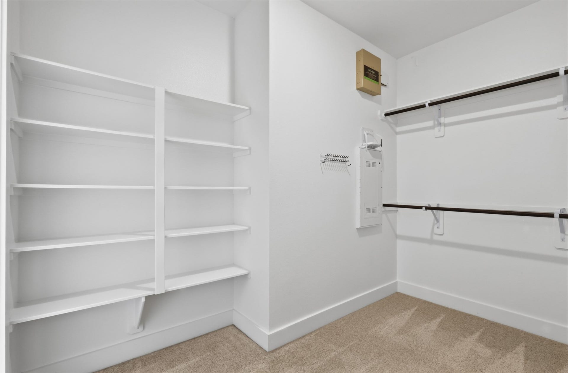 1444 W 34th 1/2 Street, Houston, TX 77018 The oversized primary walk-in closet offers excellent storage with built-in shelving and multiple hanging areas to keep everything organized.