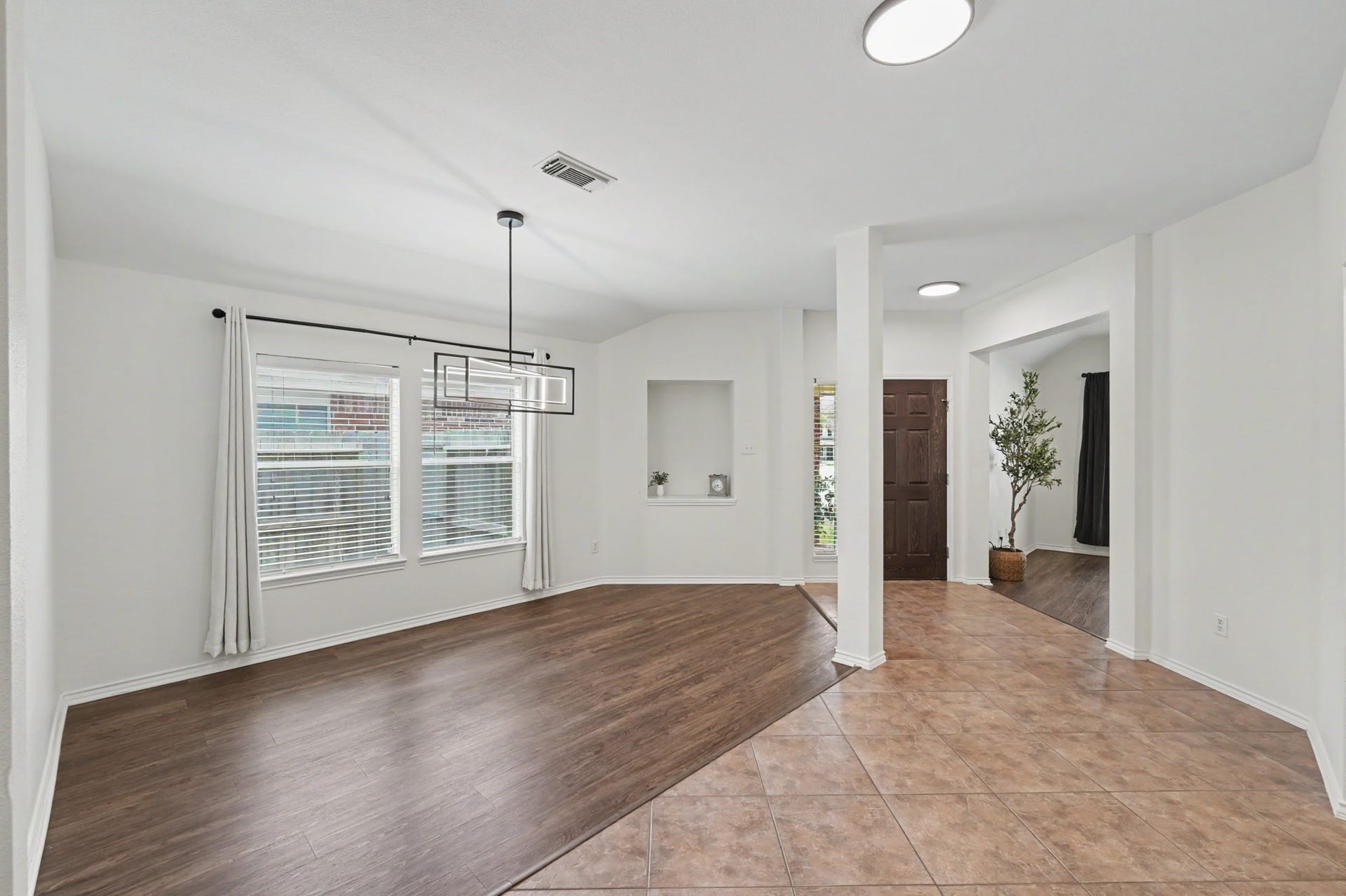 This can easily fit a large table in the space for everyone to gather around and enjoy delicious food. If you don't need a formal dining space, make this into a formal living room or hang out area.