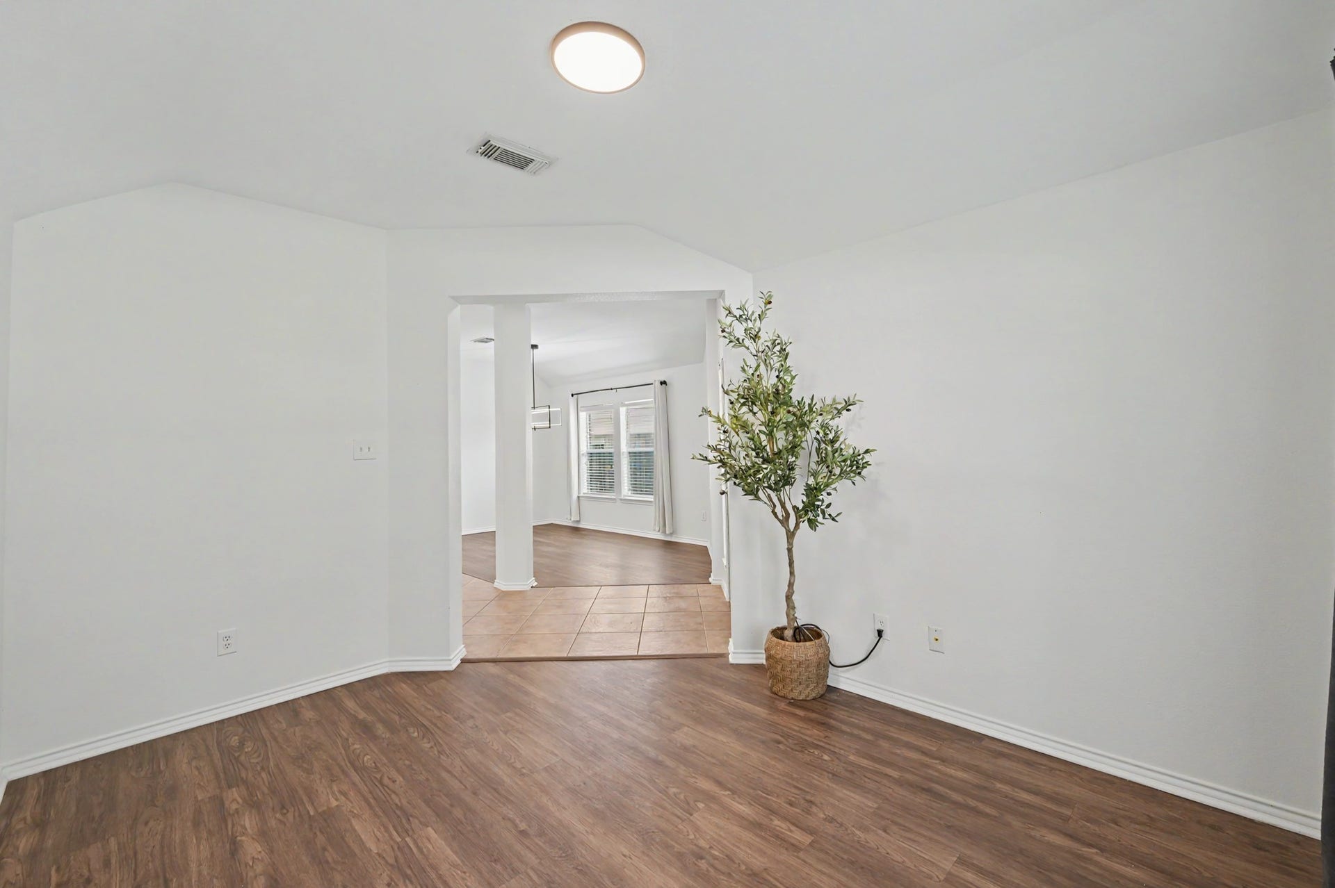 This room is perfectly tucked away for privacy while also being right near the action, the perfect combination.