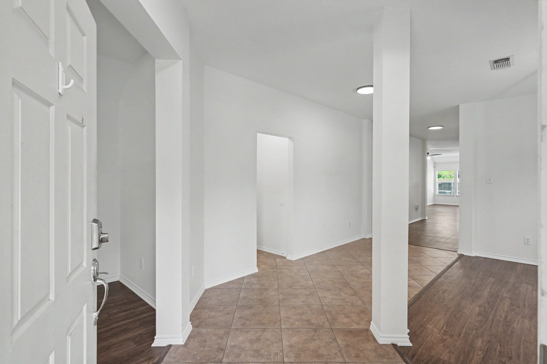 Step inside your front door to your foyer. Notice your office space to the left and your formal dining to the right.