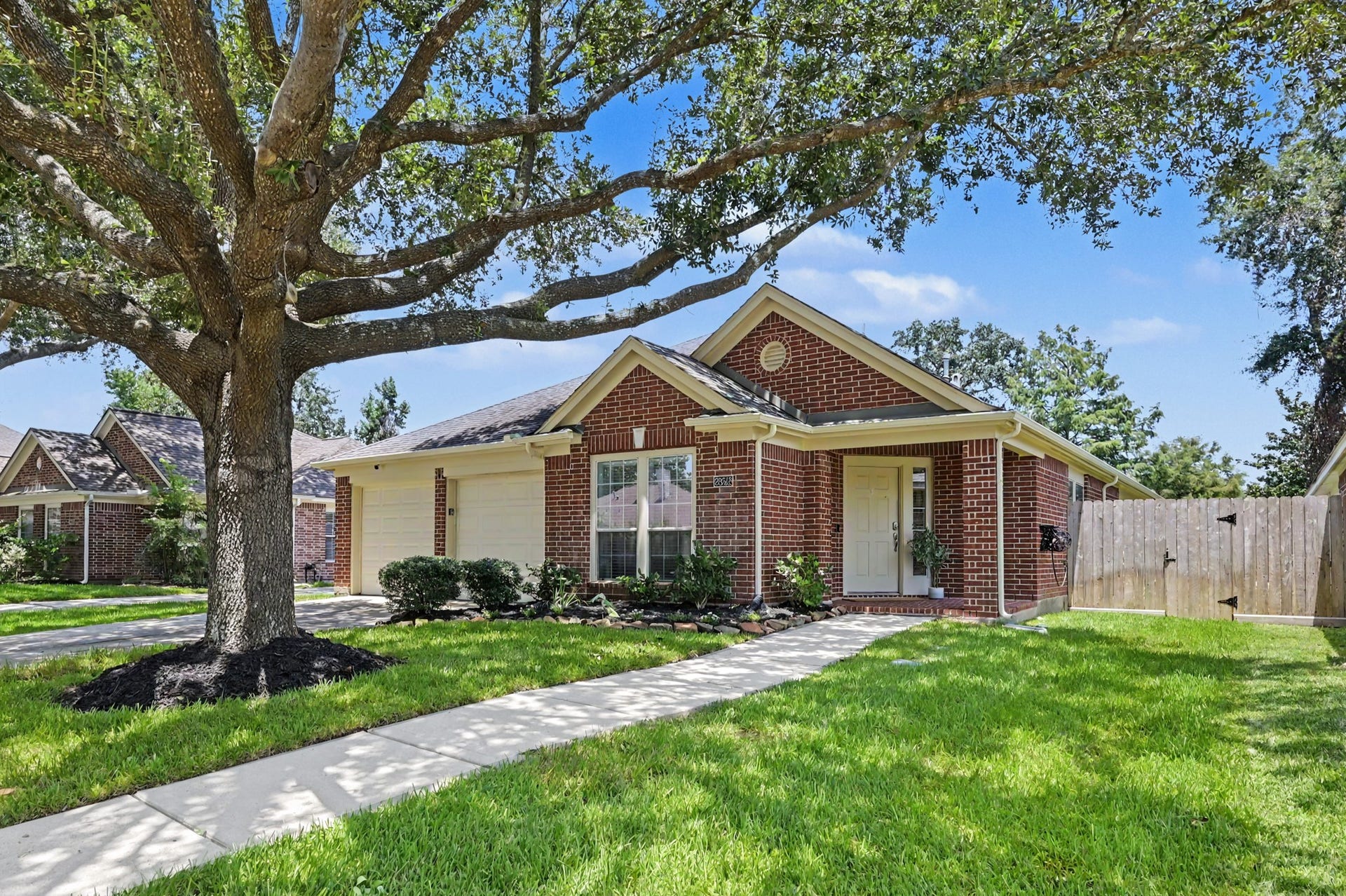 Let's take a moment for this gorgeous mature tree in your front yard. This home has some incredible curb appeal.