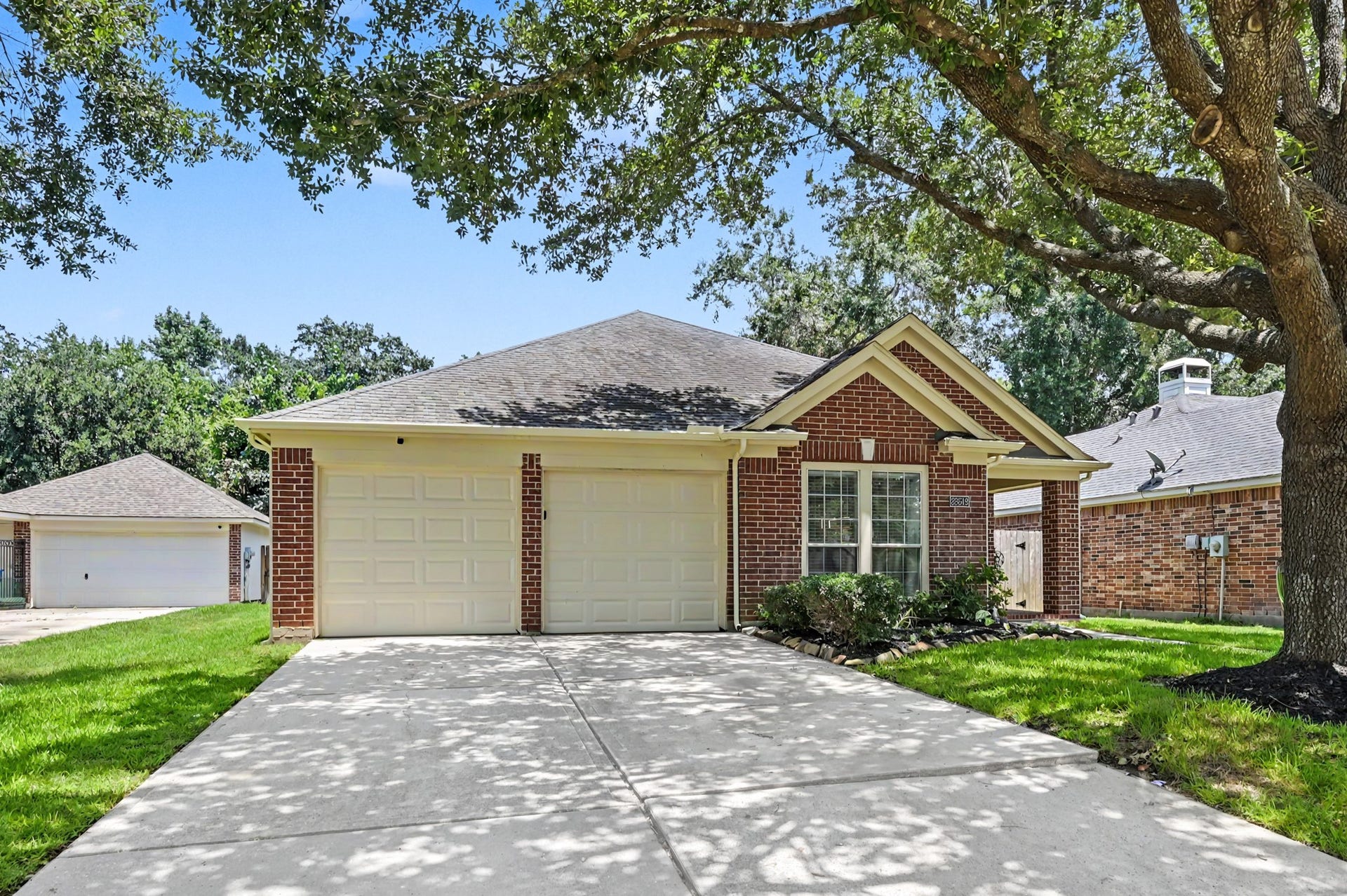 A wide driveway gives you plenty of space for any of your guests to come visit you.