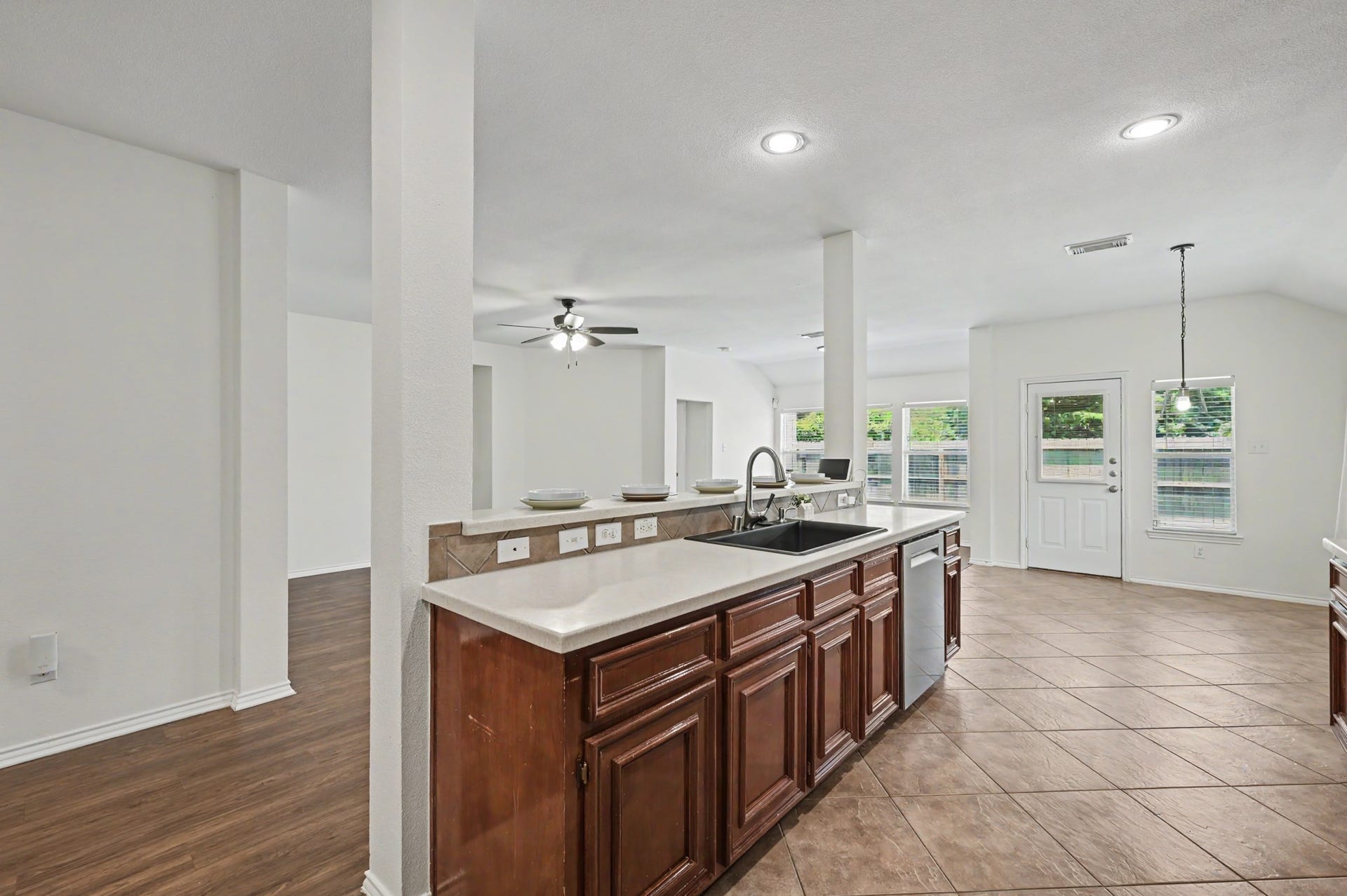 You know what makes doing dishes WAY better? Watching your favorite show on TV in your living room while you wash. SCORE! Now let's venture to your primary bedroom off the living room for a closer look.
