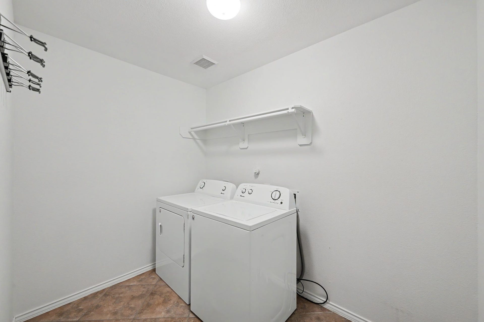 This laundry room room for supplies, hampers, and the mysterious single socks awaiting their reunion. You can even put a fridge or a folding table for extra convenience.