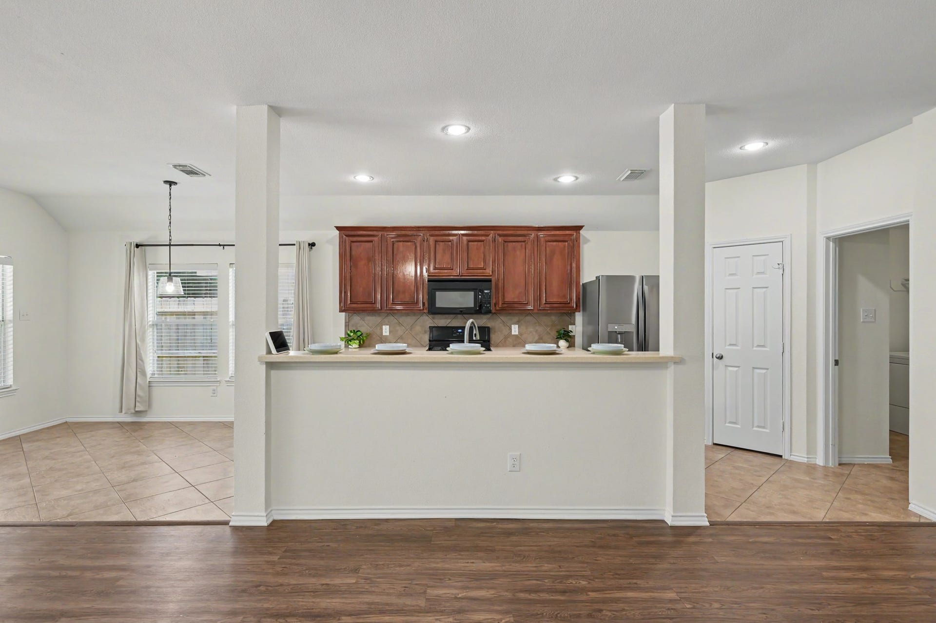 Your spacious breakfast bar easily seats 5 for all of your taste testers to keep you company while you create delicious food.