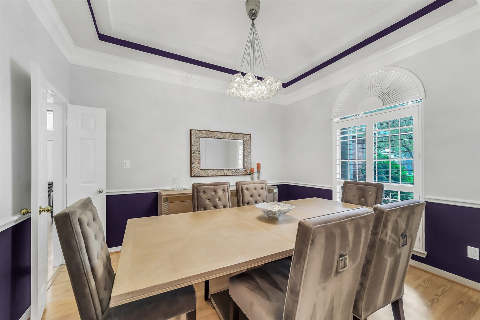 11219 Timbercreek Falls Drive, Houston, TX 77095 This formal dining room offers the perfect gathering space with tray ceiling and exquisite crown molding that add a touch of sophistication.
