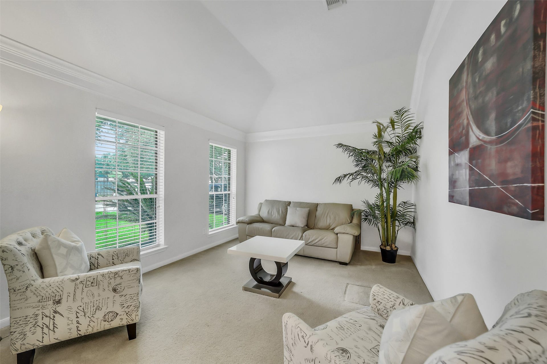 11219 Timbercreek Falls Drive, Houston, TX 77095 Upon entering, you're greeted by a bright formal living room on the left and an elegant dining area on the right, setting a welcoming and sophisticated tone for the home.