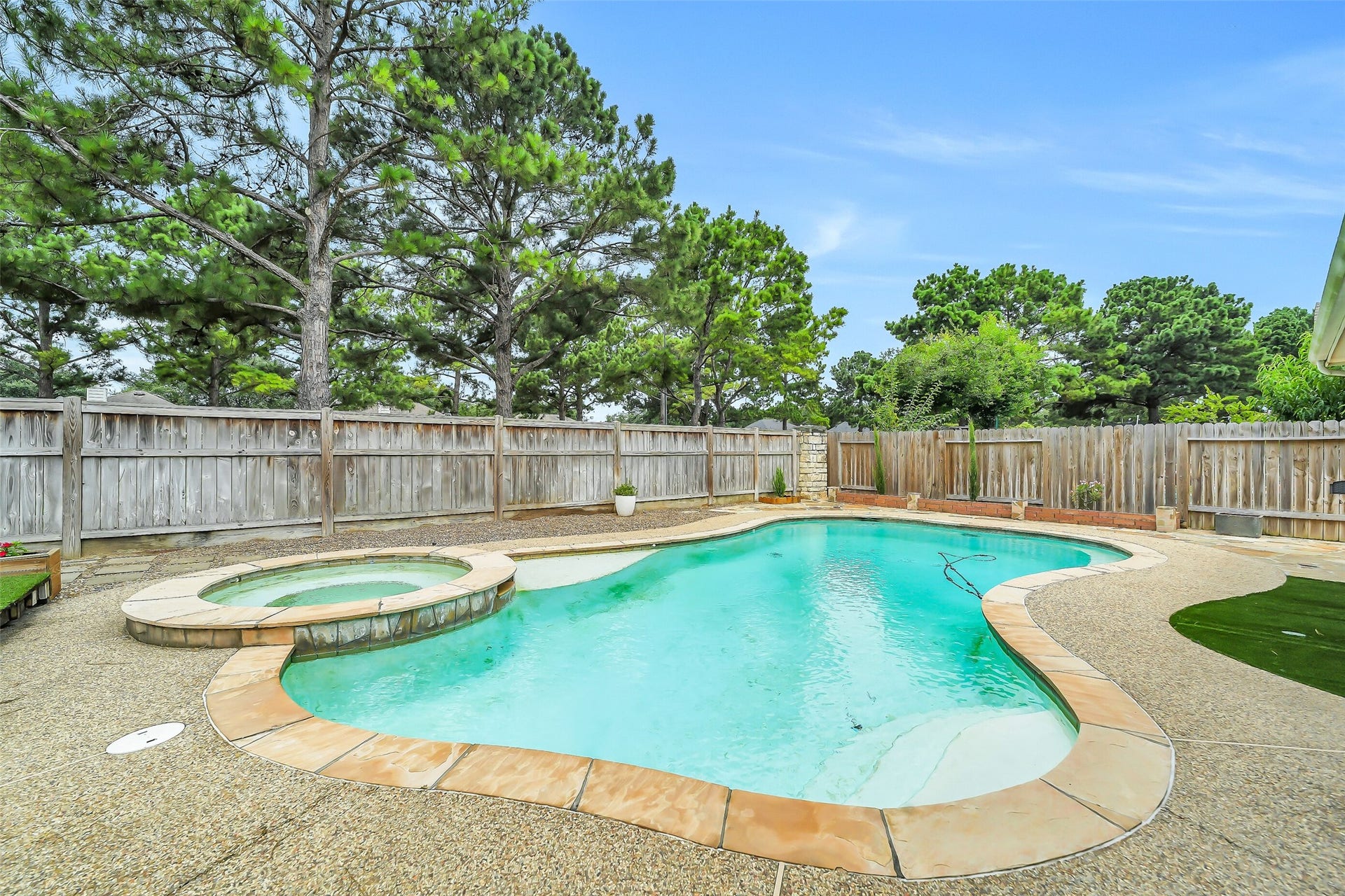 11219 Timbercreek Falls Drive, Houston, TX 77095 Another view of this beautiful backyard.