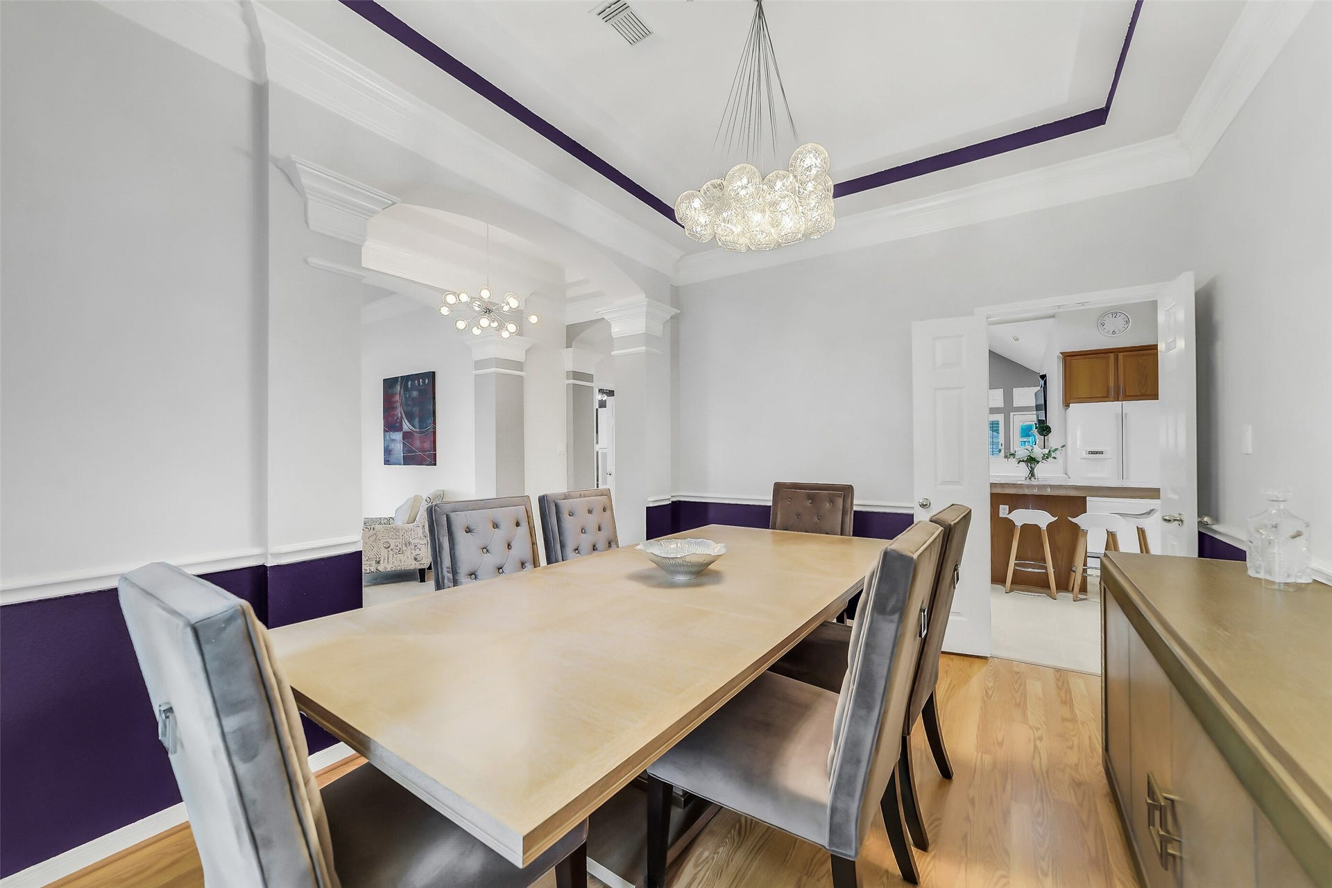 11219 Timbercreek Falls Drive, Houston, TX 77095 Formal dining room features chair rails custom custom designer colors.