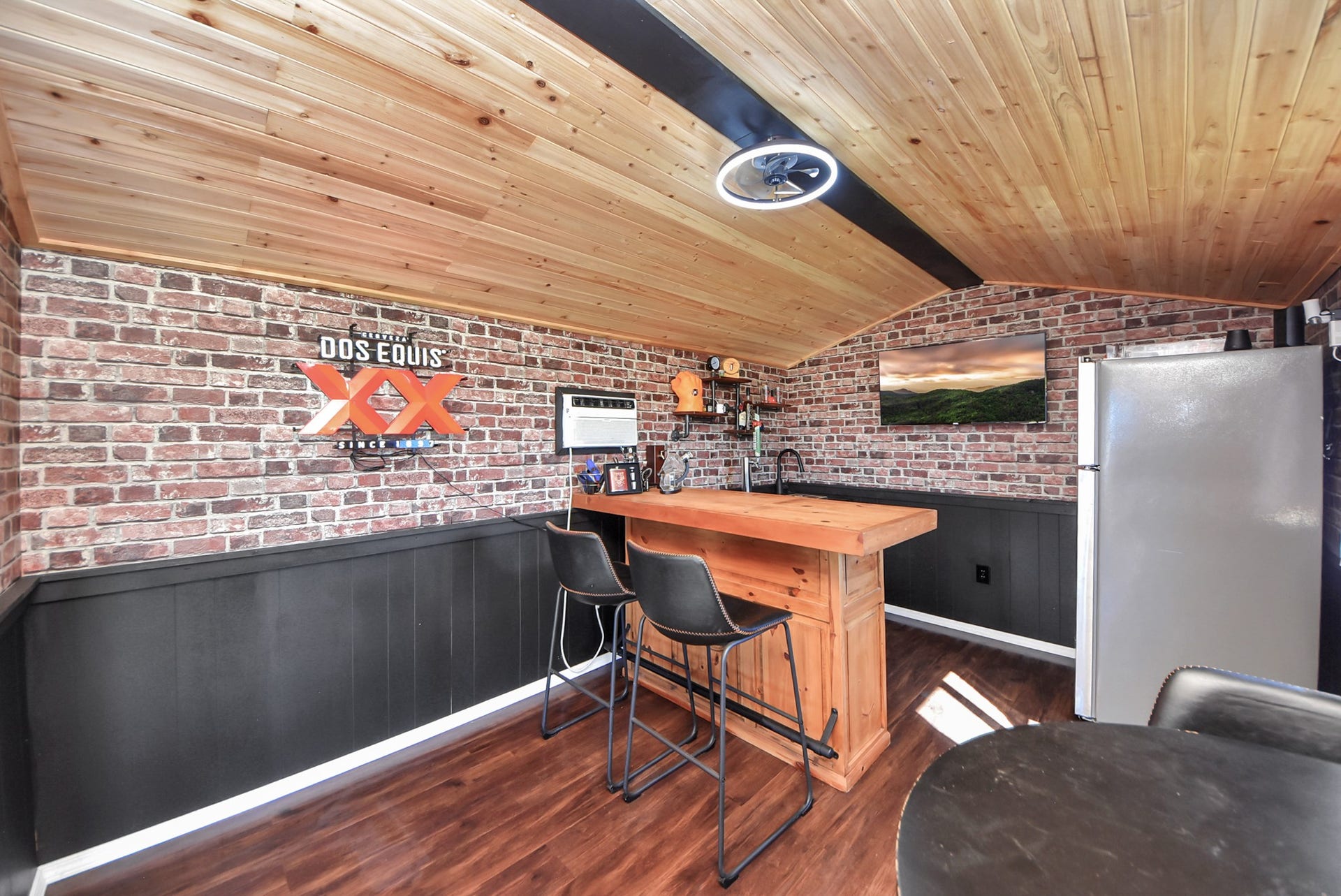 930 Pismo Lane, Rosharon, TX 77583 This is the most GENIUS SPACE! Sellers have converted a storage building to a home bar with a/c, beverage fridge, and more. This is the coolest hang out space for friends and family!