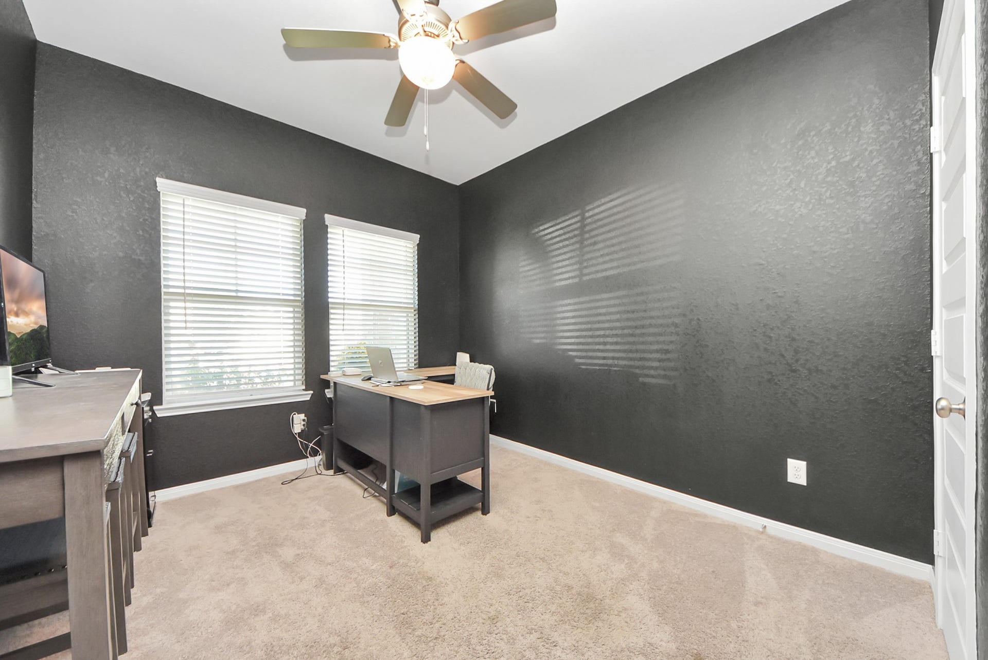 930 Pismo Lane, Rosharon, TX 77583 Secondary downstairs bedroom is currently being used for a home office and overlooks the front yard.