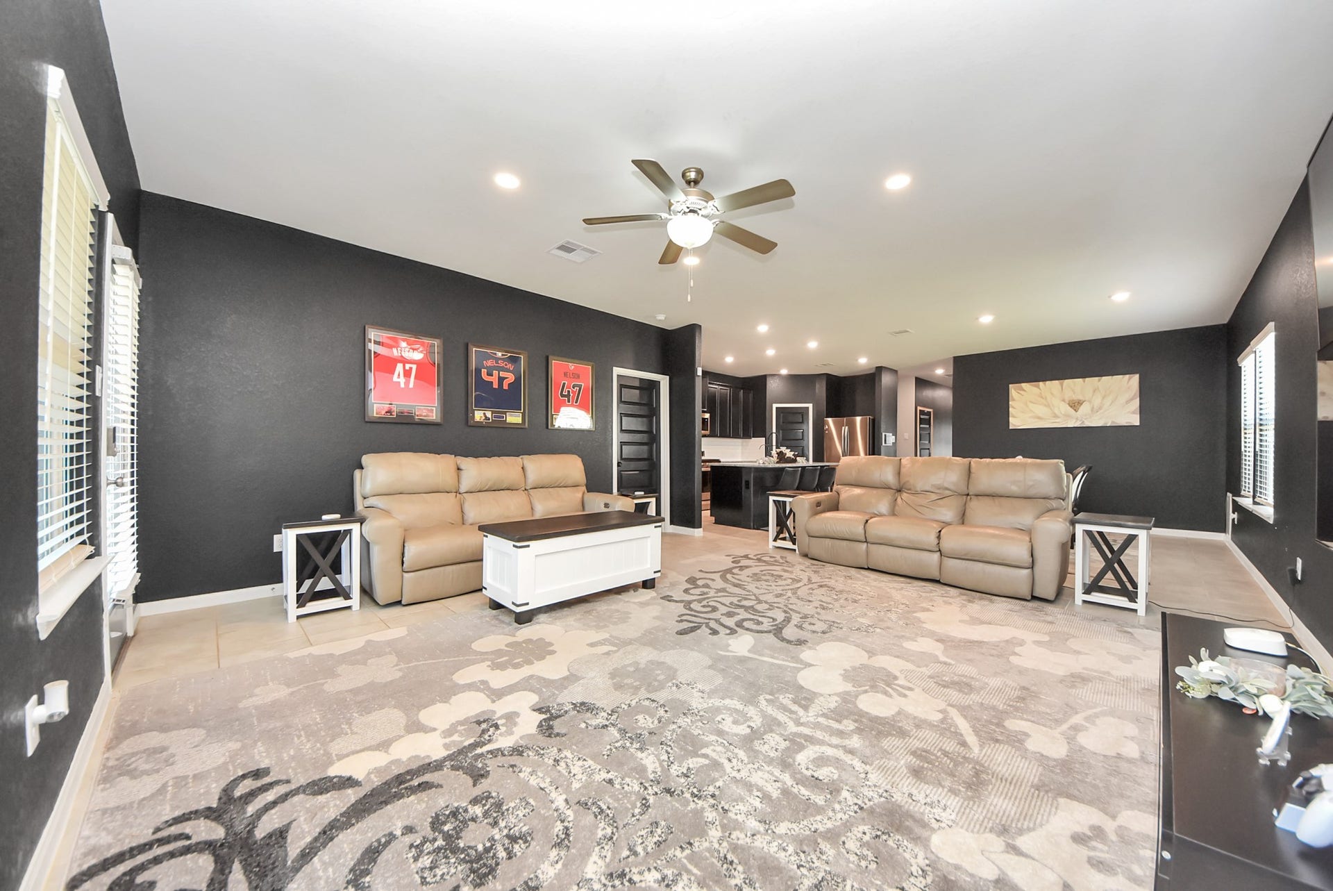 930 Pismo Lane, Rosharon, TX 77583 View of this space shows kitchen open to dining and living. Lots of recessed LED lights ensure well-lit spaces throughout.