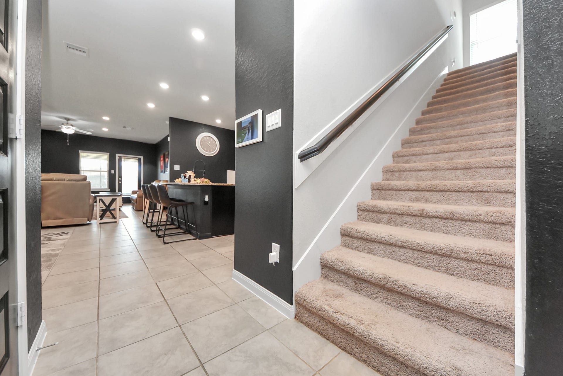 930 Pismo Lane, Rosharon, TX 77583 Gorgeous, welcoming entryway with the perfect spot for mud lockers adjacent to the stairs.