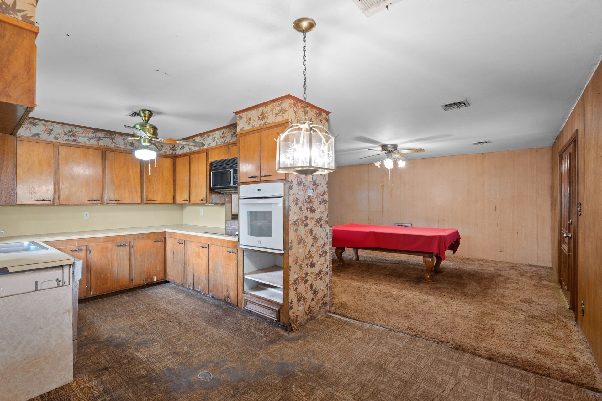 8218 Avenue M, Santa Fe, TX 77510 Kitchen opens to an adjoining entertainment area.