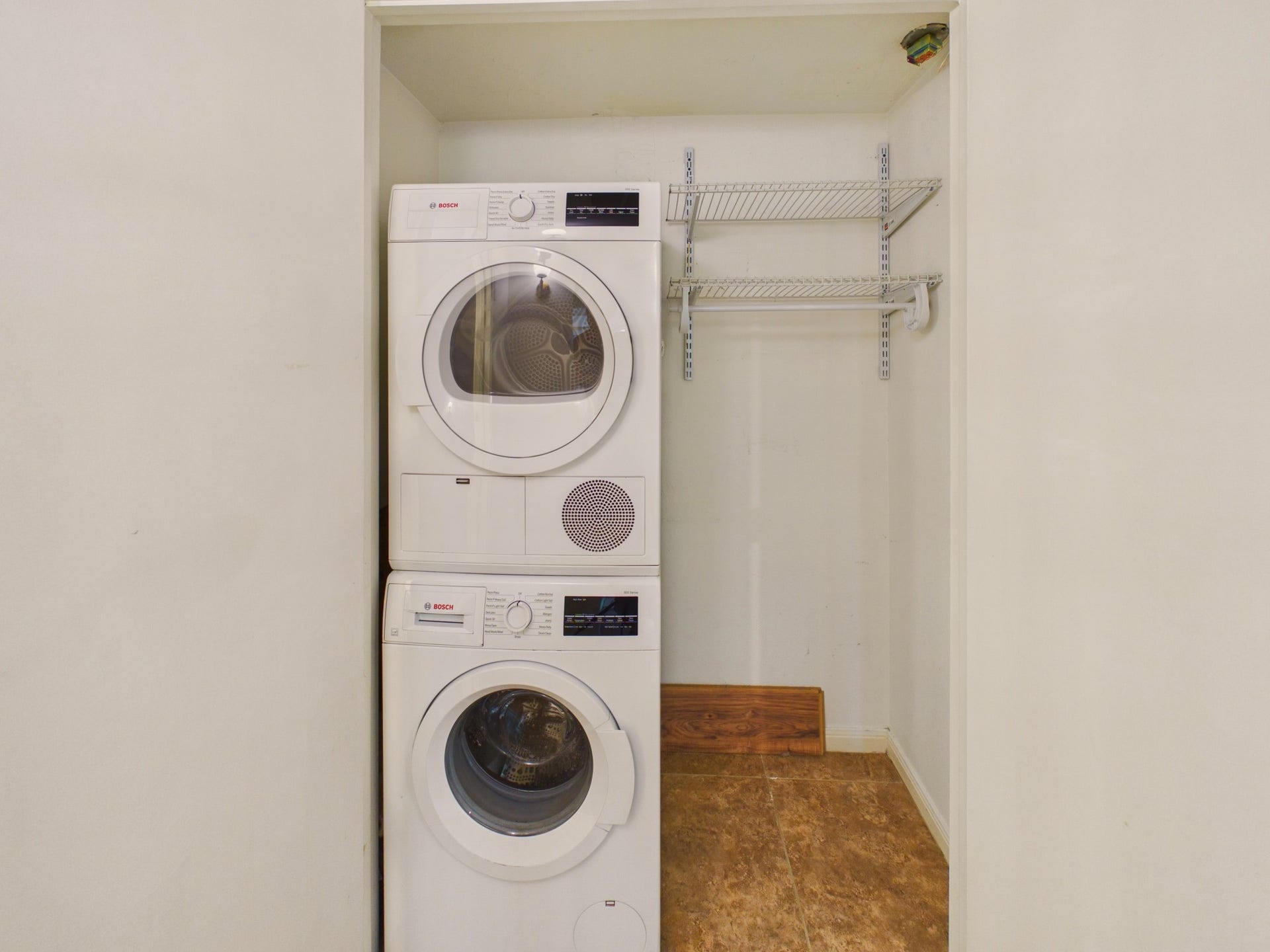 6404 Bayou Glen Road, Houston, TX 77057 Utility Closet with Full Sized Stacked Washer & Dryer Included