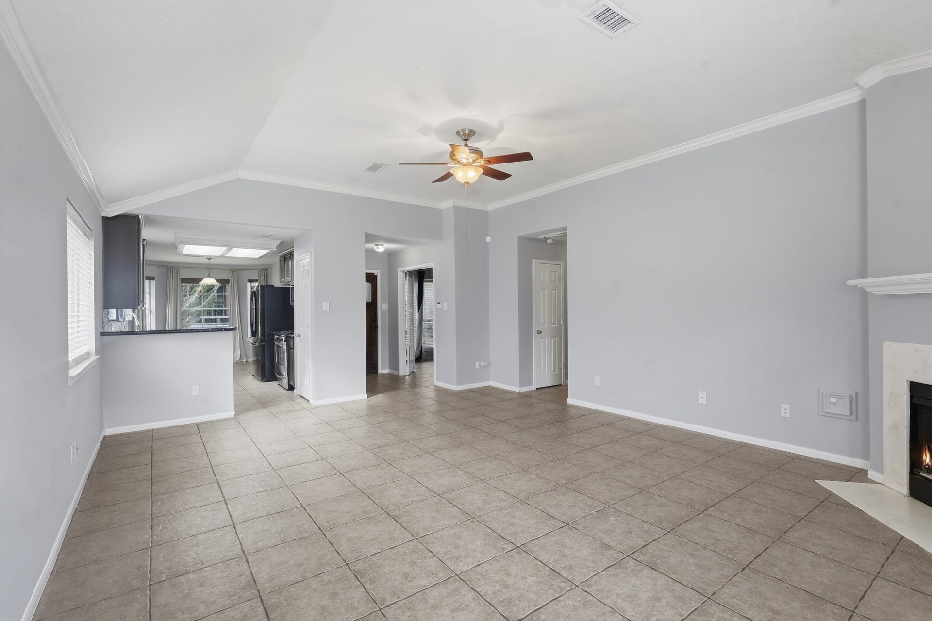 1242 Hunter Wood Drive, League City, TX 77573 Open living and dining combination offers flexible space for everyday living and entertaining.