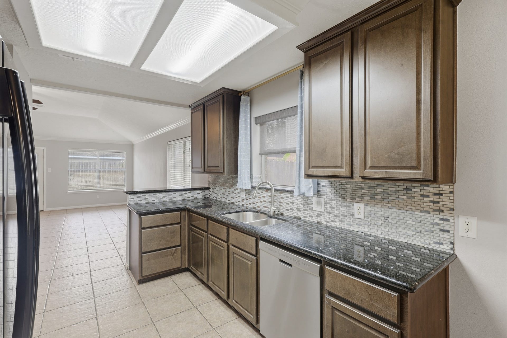 1242 Hunter Wood Drive, League City, TX 77573 Updated kitchen offers abundant cabinetry and an easy-flow layout
