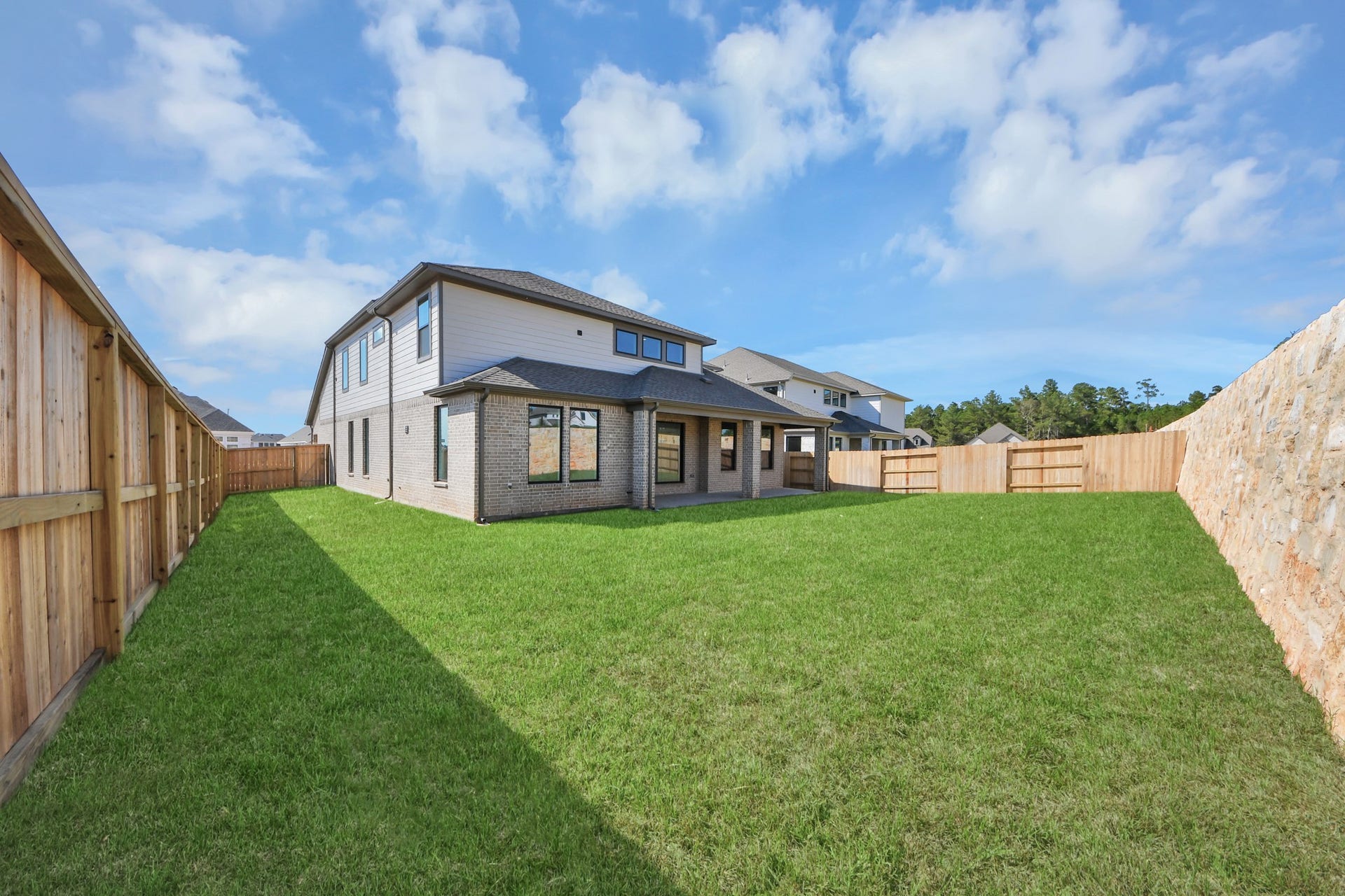 2052 Thimbleberry Lane, Magnolia, TX 77355 Come and see this spacious backyard with its beautiful covered patio. There is plenty of room for the kids to play and adults to relax. Perfect for your outdoor living space, patio furniture, bbq pit, and so much more. The possibilities are endless!