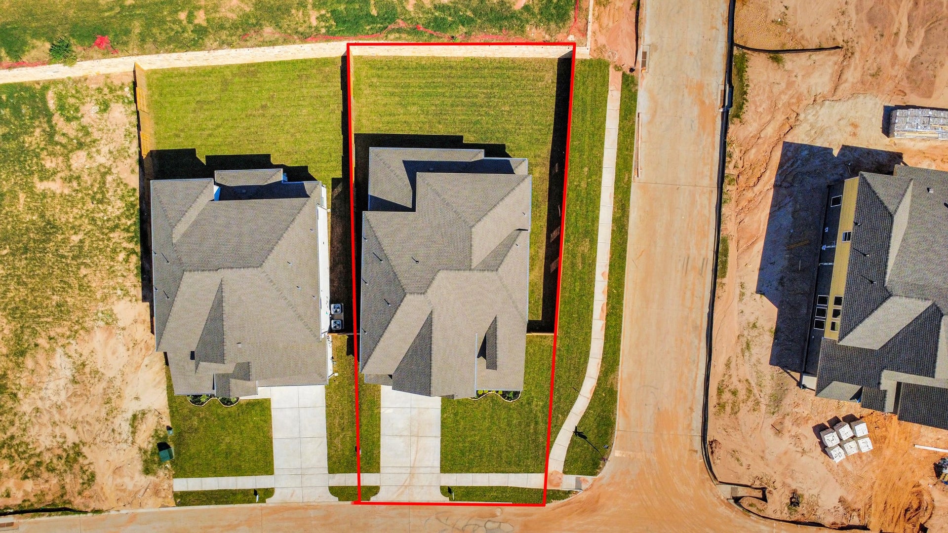 2052 Thimbleberry Lane, Magnolia, TX 77355 An aerial view of a spacious subdivision lot, highlighting a well-maintained yard and a fully fenced perimeter, offering both privacy and expansive outdoor space.