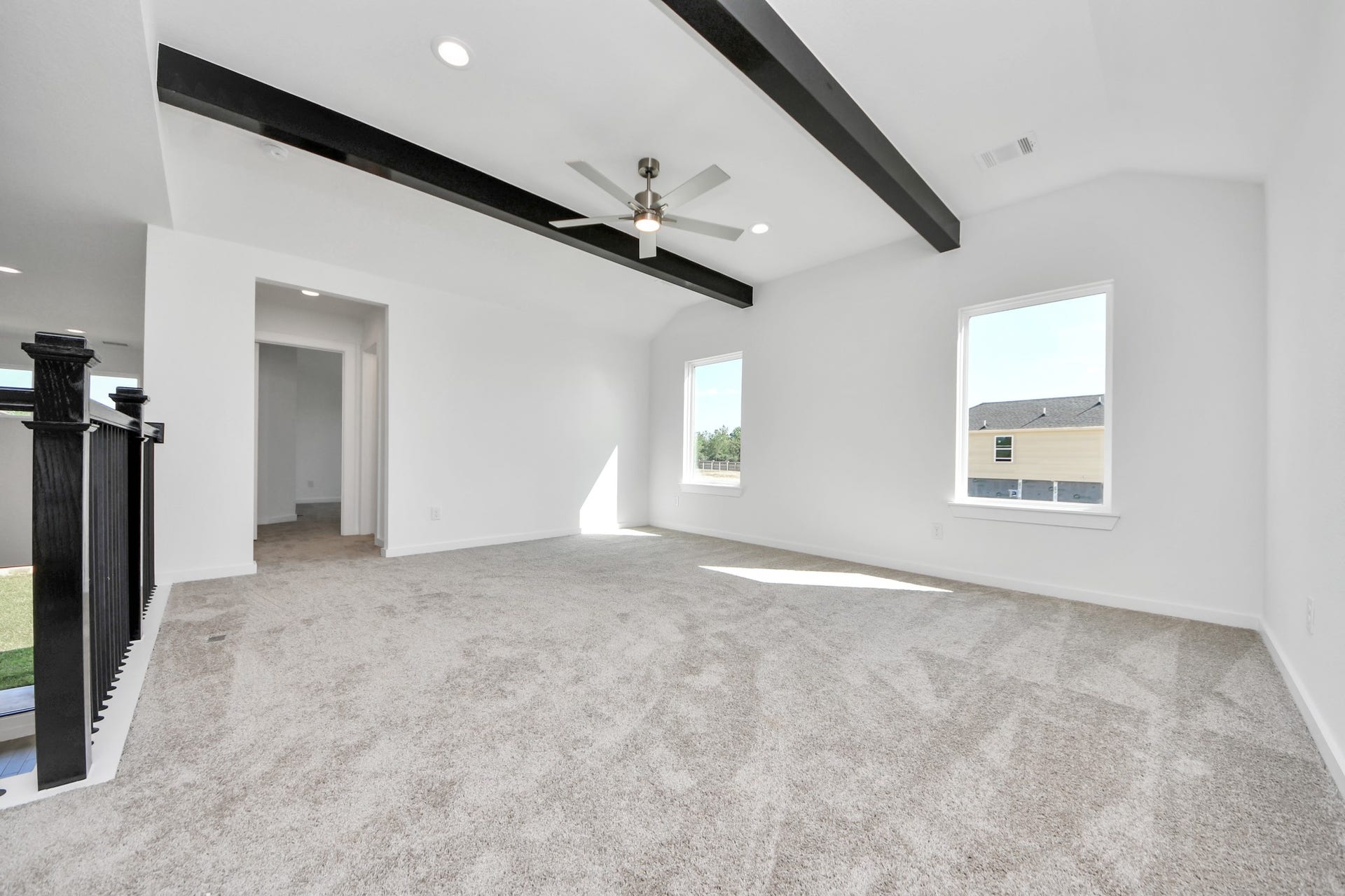 2052 Thimbleberry Lane, Magnolia, TX 77355 Come upstairs and enjoy a day of leisure in this fabulous game room! This is the perfect hangout spot or adult game room! Features plush carpet, high ceilings, custom paint and windows for plenty of natural light.