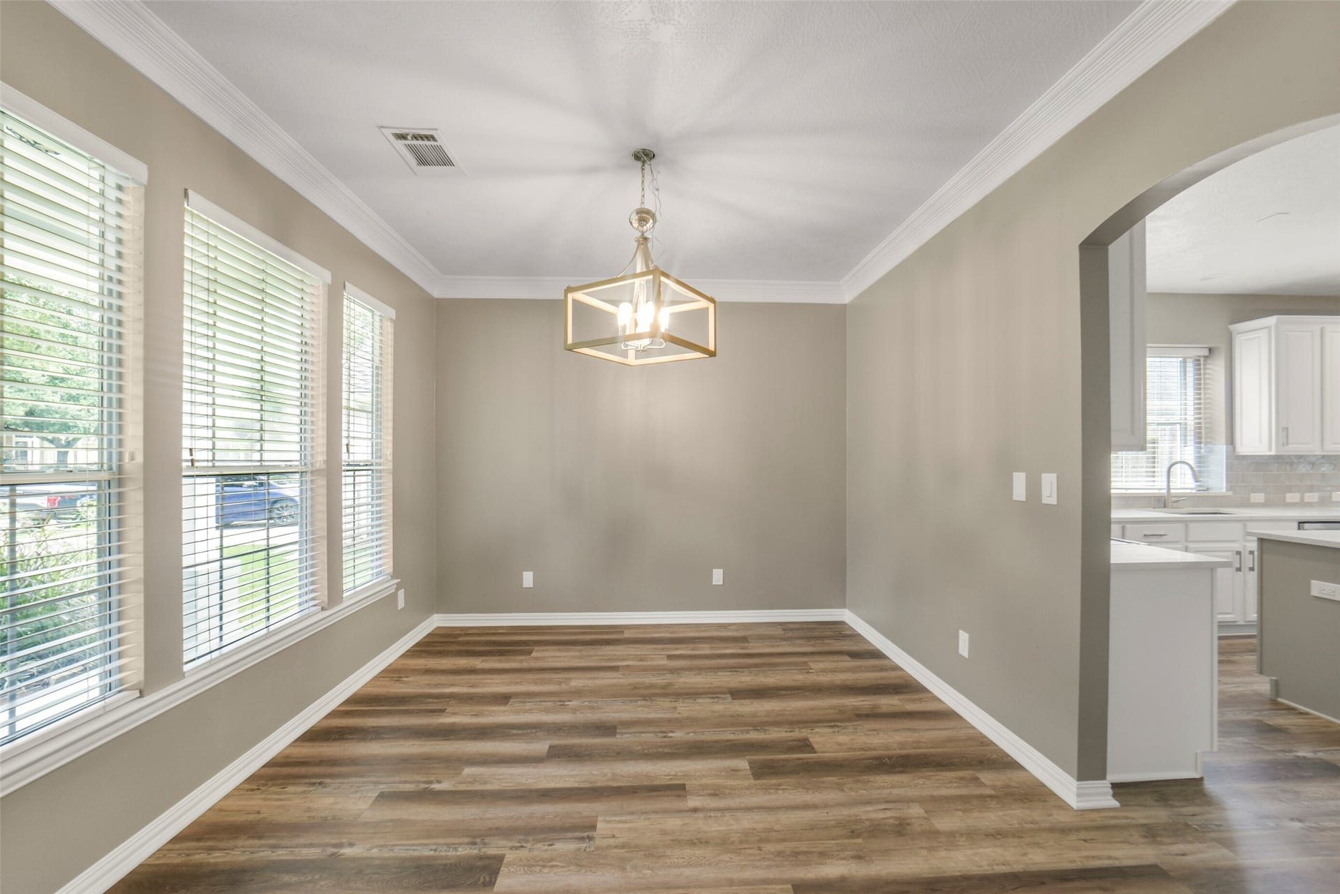 13023 Norstrum Falls Court, Cypress, TX 77429 Host memorable dinners in the elegant formal dining room, perfectly positioned for effortless entertaining.