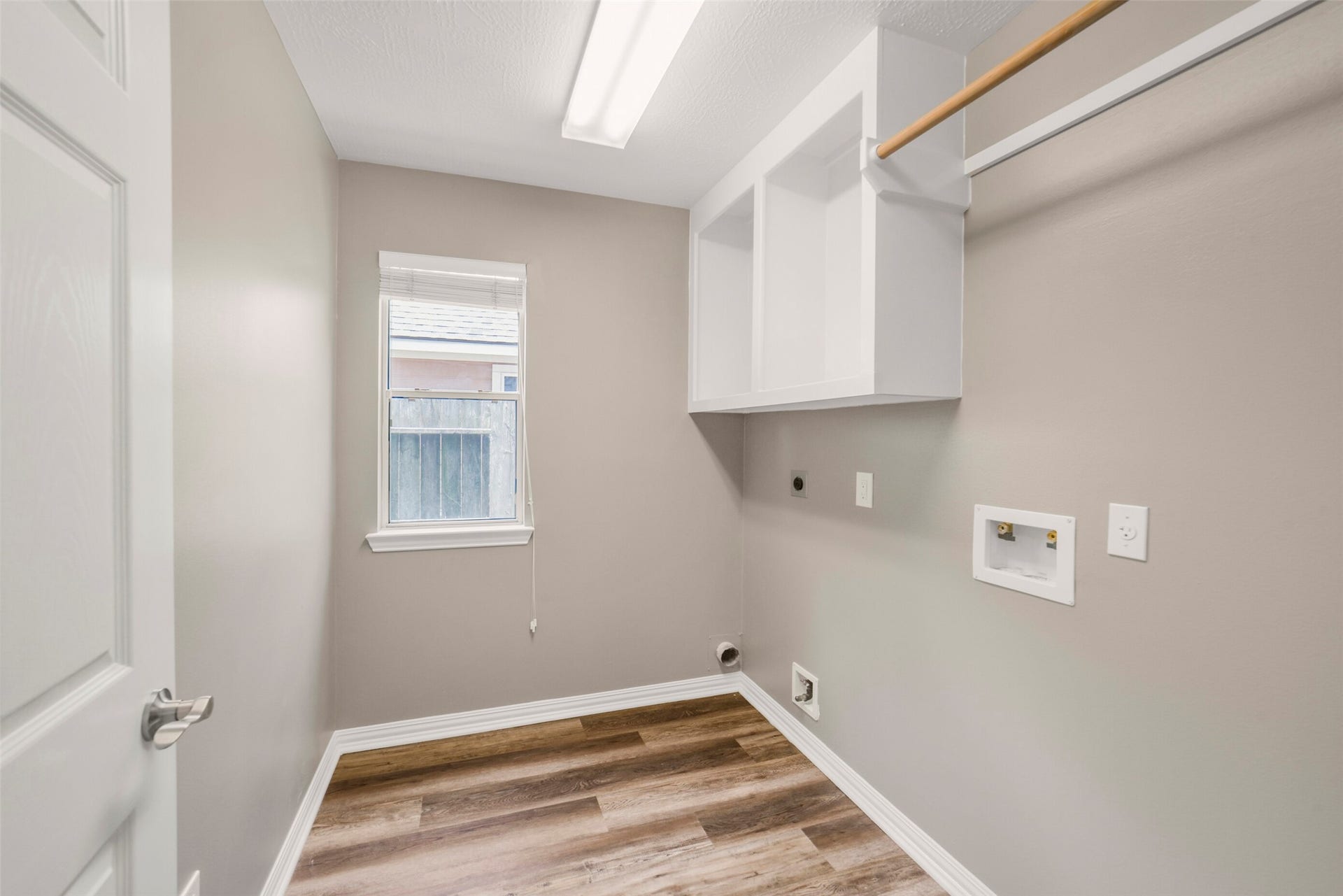 13023 Norstrum Falls Court, Cypress, TX 77429 The dedicated utility/laundry room offers excellent functional space, built-in storage, and convenient organizing options.