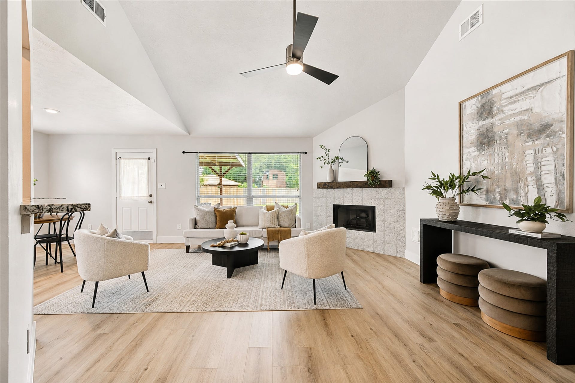 4931 Lake Catherine Court, Richmond, TX 77407 Staged to showcase an open-concept living area where soaring ceilings, natural light and easy access to the kitchen create the heart of the home