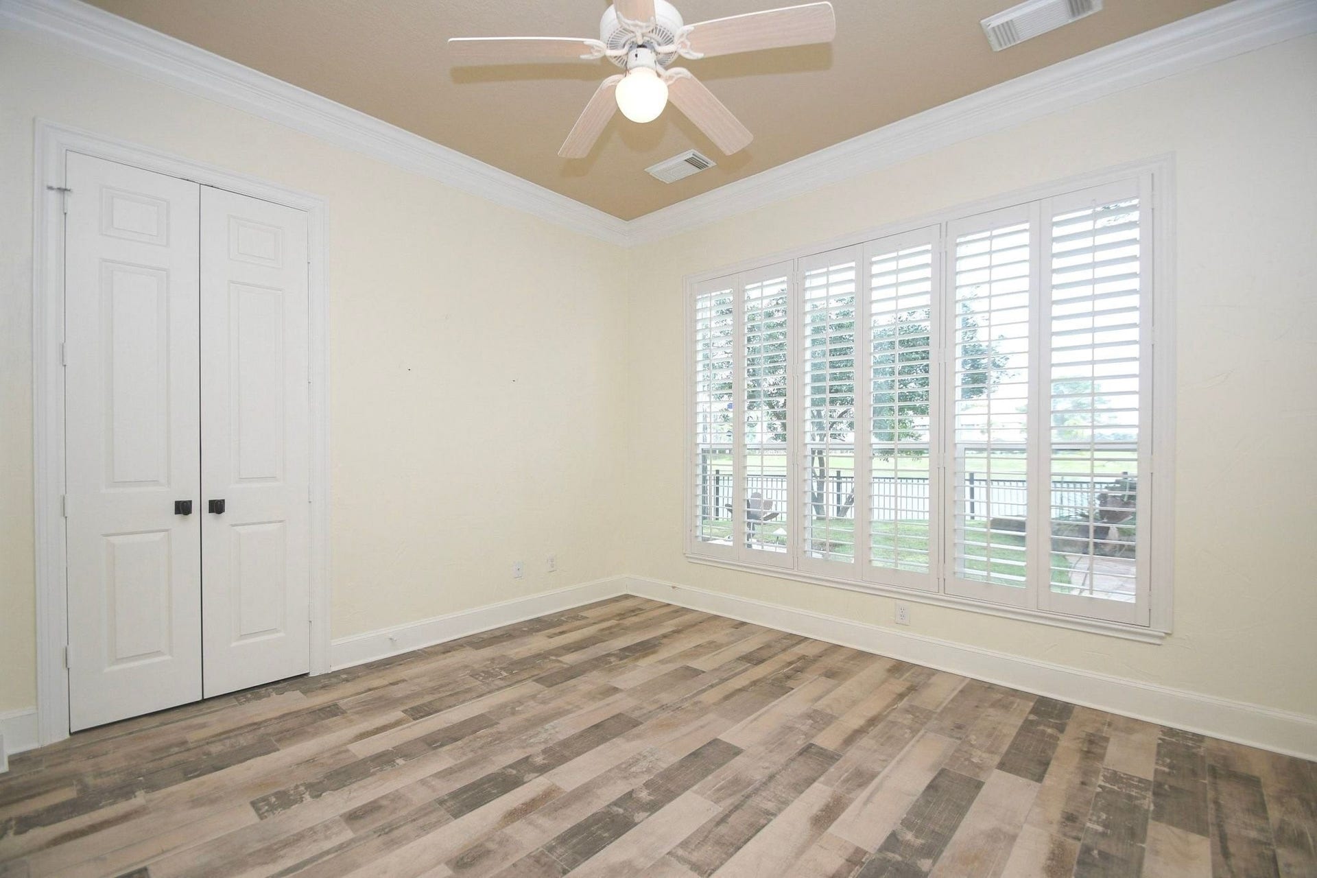 5206 Cedar Bend Creek, Houston, TX 77041 Another bedroom offers a truly expansive layout, providing ample room for a peaceful sleeping area as well as a versatile flex space that can easily accommodate a quiet home office, a cozy reading nook, or a dedicated personal fitness zone. With its generous proportions and seamless flow, this tranquil retreat serves as a perfect blank canvas to tailor toward your unique lifestyle needs, ensuring comfort, productivity, and relaxation all in one beautifully appointed room!