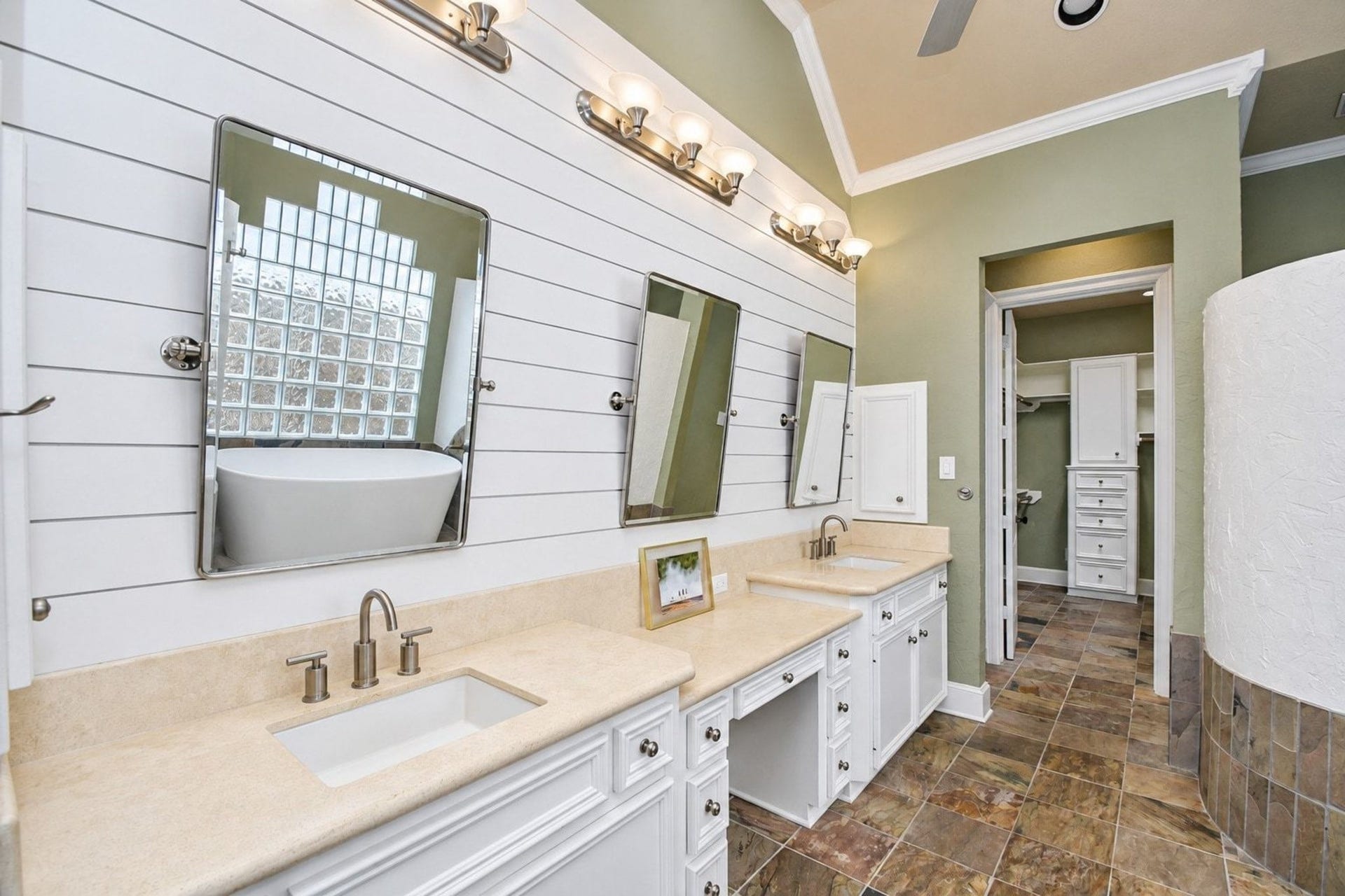 5206 Cedar Bend Creek, Houston, TX 77041 This beautifully custom primary bathroom serves as a luxurious retreat, featuring an expansive double vanity equipped with elegant dual sinks, premium finishes, and ample counter space, providing both style and convenience for busy mornings and relaxing evenings!