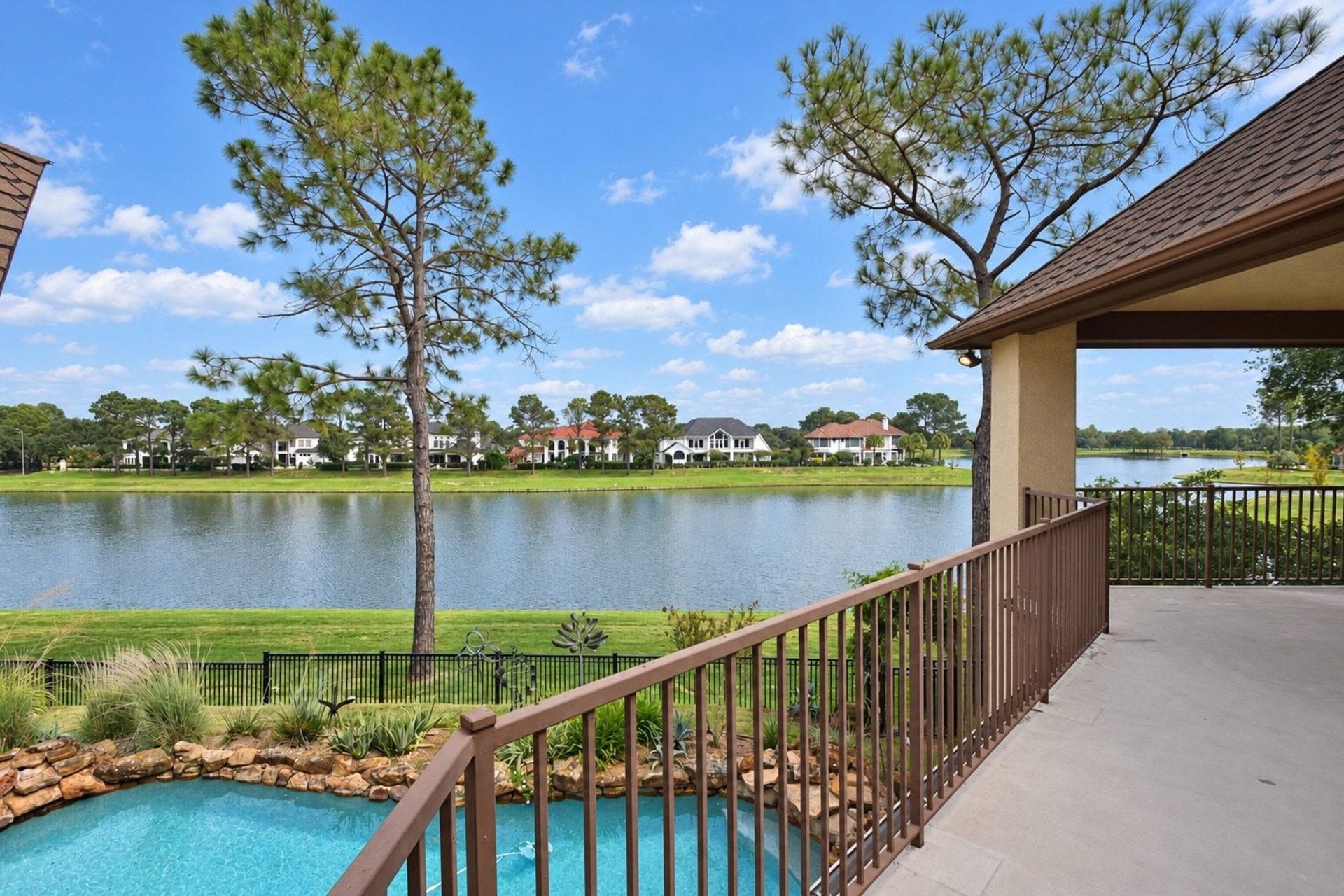5206 Cedar Bend Creek, Houston, TX 77041 Large covered upstairs patio providing expansive, panoramic views of the surrounding landscape. This elevated outdoor living space offers the perfect vantage point for sunset watching and alfresco dining!