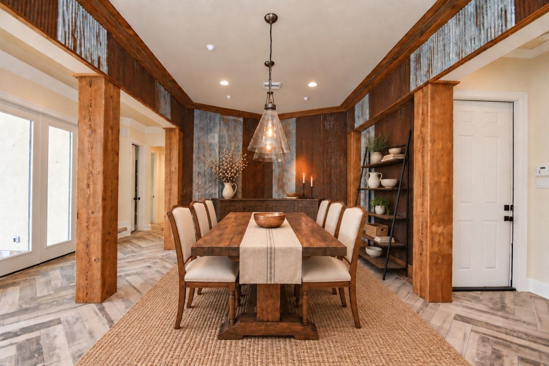 5206 Cedar Bend Creek, Houston, TX 77041 Virtually staged dining room featuring custom millwork, designer lighting, and staged furniture to showcase optimal layout and entertaining potential!