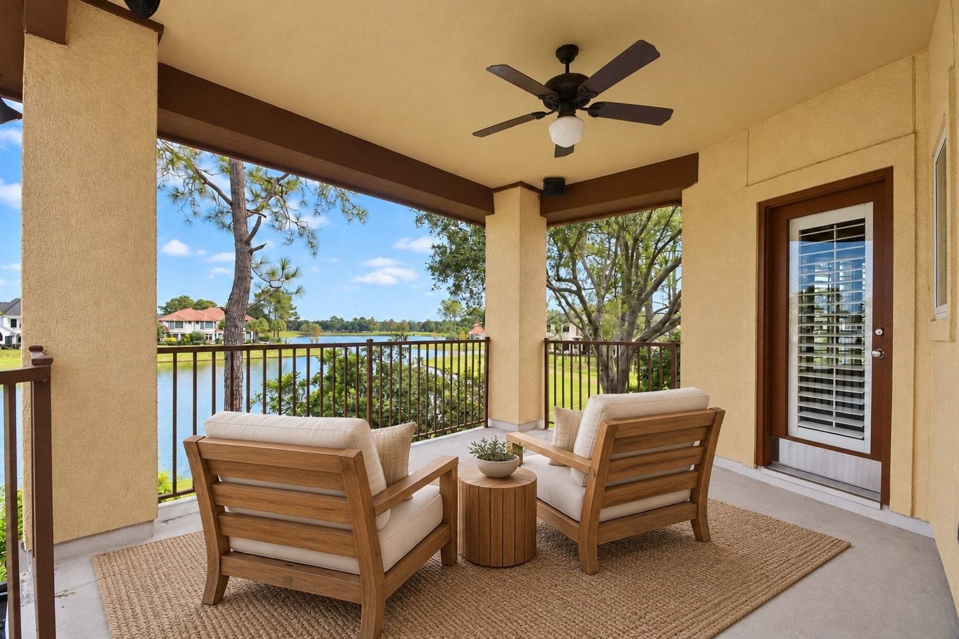 5206 Cedar Bend Creek, Houston, TX 77041 This image features professional virtual staging to showcase the potential of the upstairs patio, an inviting outdoor space perfectly positioned to enjoy tranquil, panoramic views of both the serene lake and the sparkling pool below!