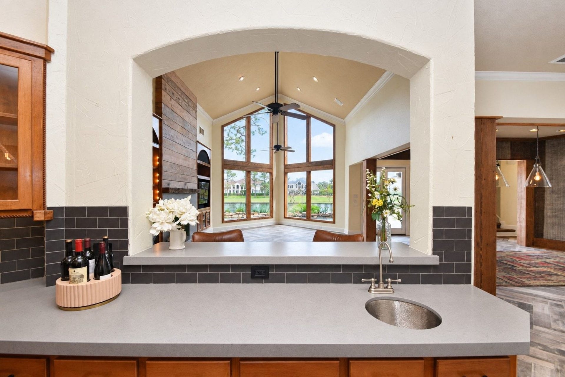 5206 Cedar Bend Creek, Houston, TX 77041 View from the kitchen looking into the spacious living area, characterized by magnificent panoramic views and an abundance of natural light!