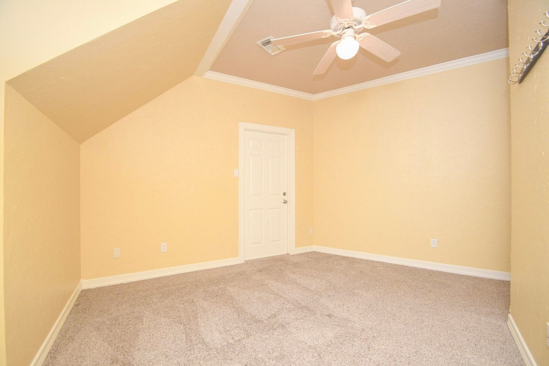 5206 Cedar Bend Creek, Houston, TX 77041 Another bedroom with ample space for sleep and play, featuring large windows that invite natural light and provide a versatile layout perfect for a restful sanctuary or a productive hobby area!