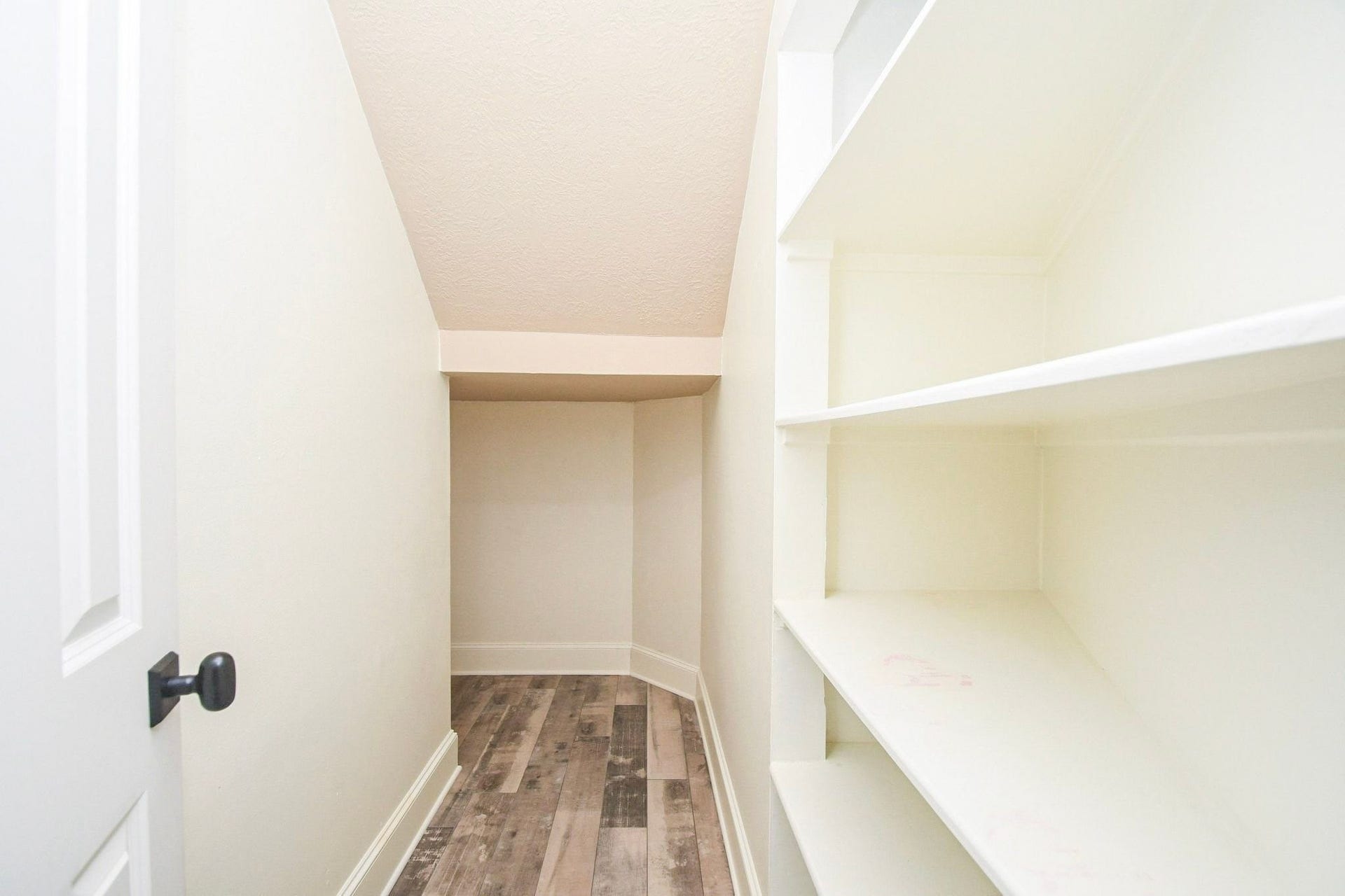 5206 Cedar Bend Creek, Houston, TX 77041 This exceptionally spacious, well-lit walk-in storage. offers convenient and accessible storage throughout the year. Space to store items, or extra gear, helping to keep the main living areas clutter-free and pristine. A practical and highly functional feature that adds significant utility to the homes overall storage capacity.