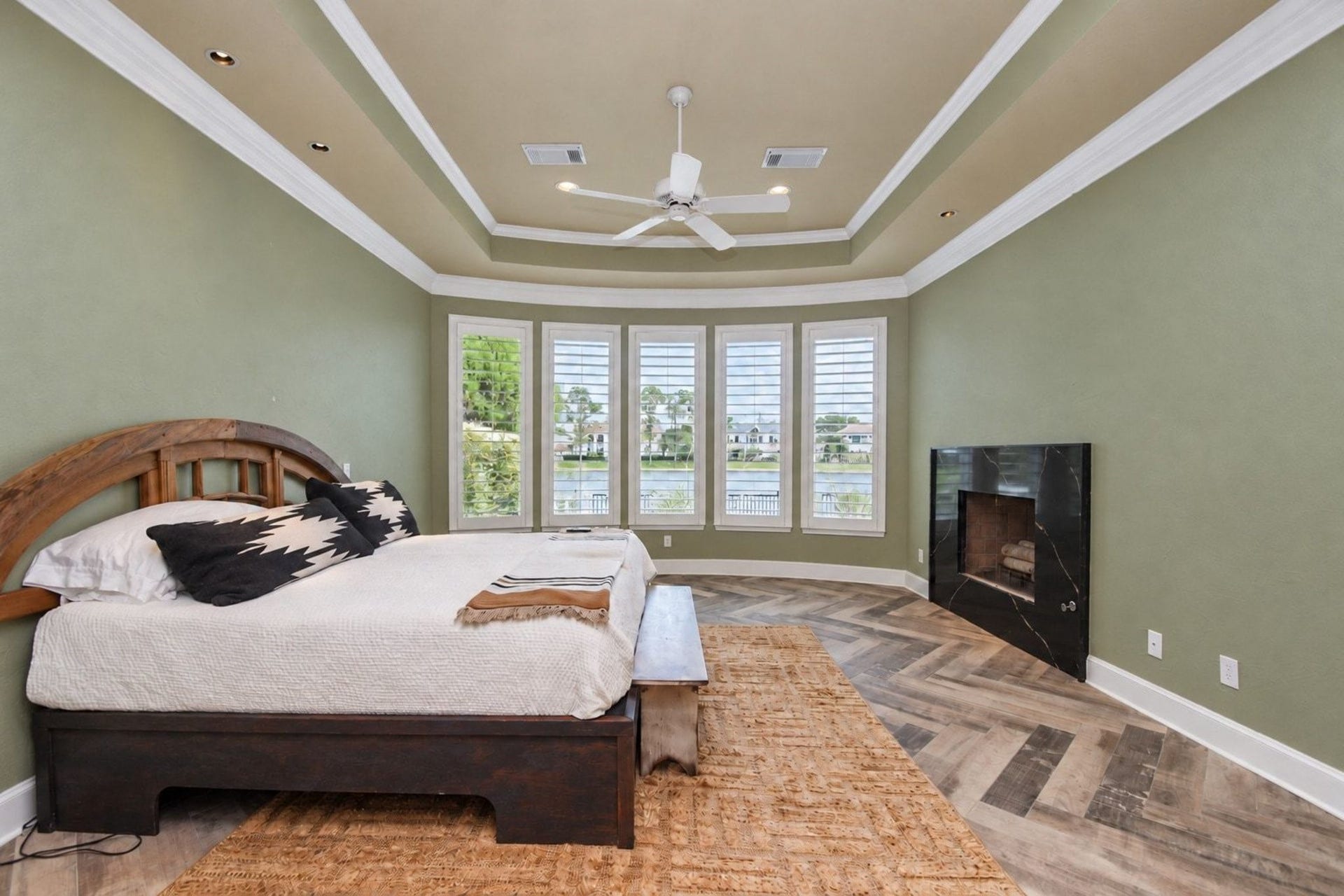 5206 Cedar Bend Creek, Houston, TX 77041 This spacious master bedroom serves as a serene retreat, beautifully enhanced by a sophisticated custom paint palette that adds a touch of modern elegance to the room. Beyond its aesthetic appeal, the suite features an exceptionally large, well-organized closet that provides ample storage and functional utility, catering to the needs of discerning buyers who prioritize both style and practical living space in their search for the perfect home.windows