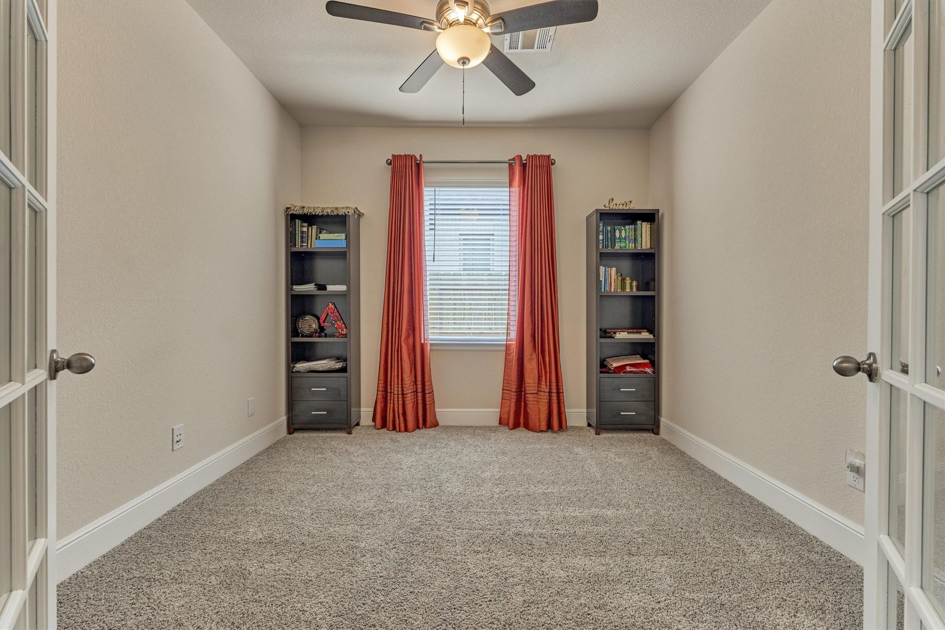 The spacious office is to the right of the entry.