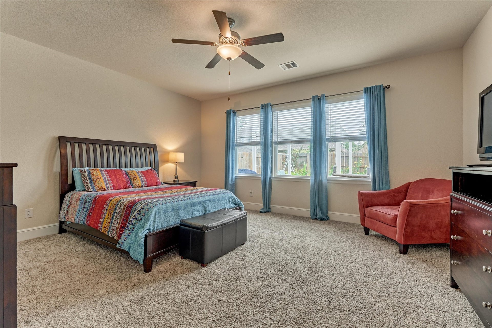 The main bedroom with a view of the pool.