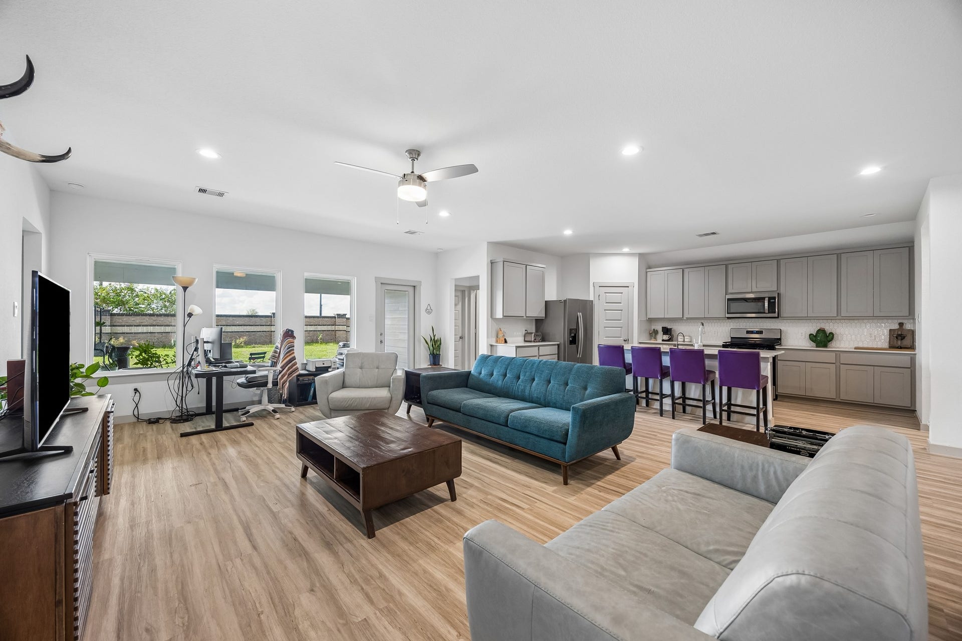3938 Hordley Terrace Trail, Fulshear, TX 77441 Bright, open living space with plenty of natural light and an easy flow into the kitchen, giving the main living area a comfortable and connected feel.