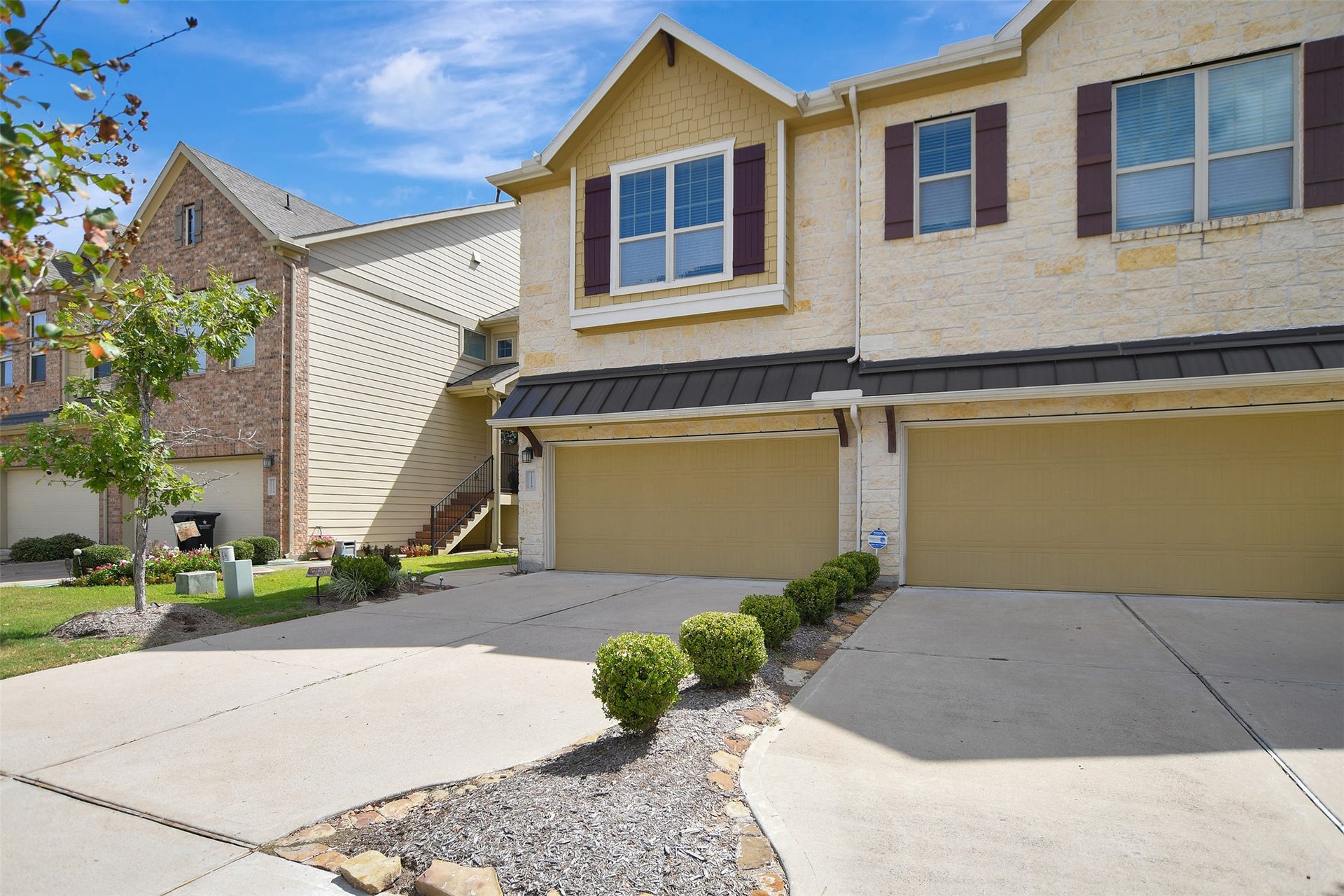12210 La Strada Street, Richmond, TX 77406 Doublewide garage with long driveway for additional parking.