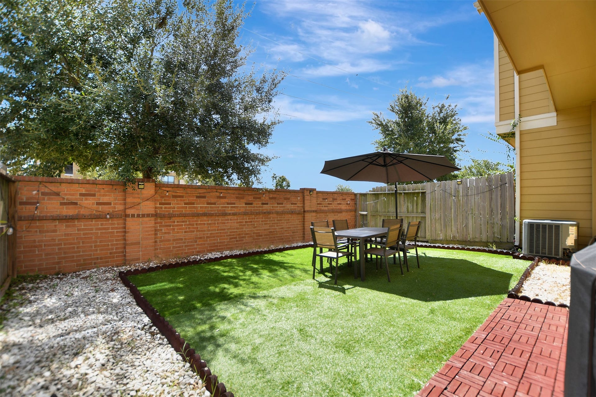 12210 La Strada Street, Richmond, TX 77406 Fully fenced back yard.