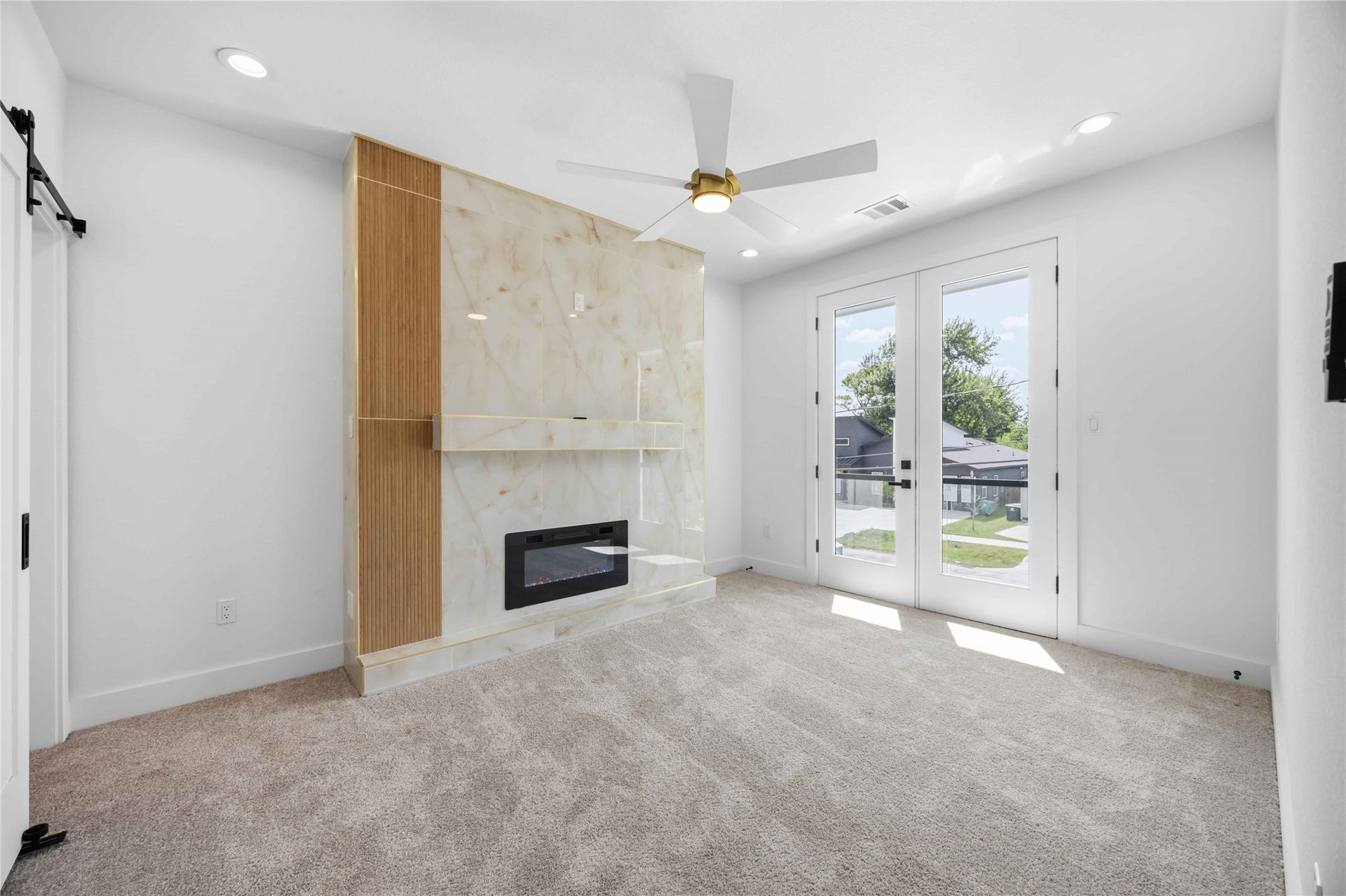 Primary bedroom features private balcony